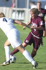 Lori Sims excels on the field and in the classroom.