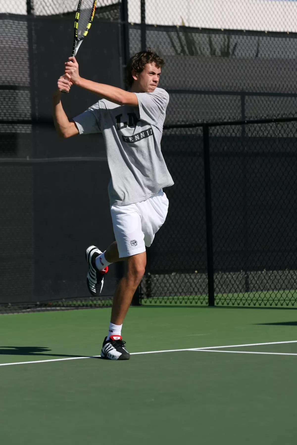 Jacek Twarowski and the Lions top Hawaii 4-3 Monday at the LMU Tennis Center.