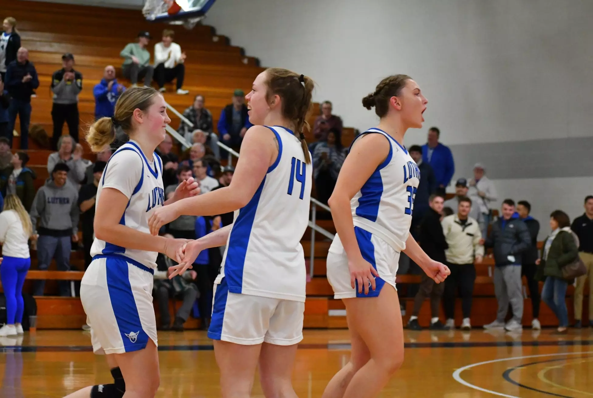 Women's basketball celebrates the win over Simpson 2025