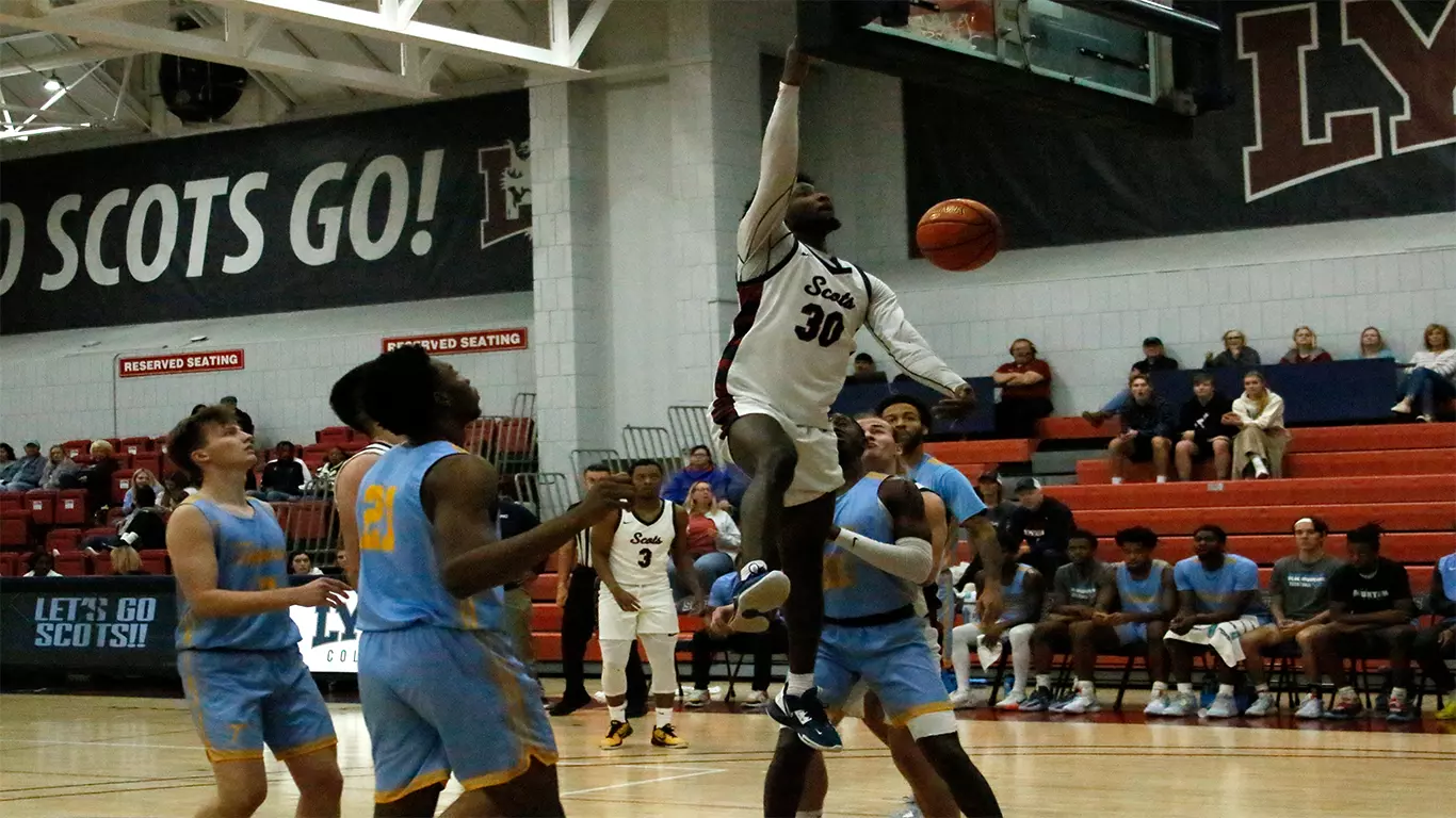 Sando Hill gets a dunk against Blue Mountain