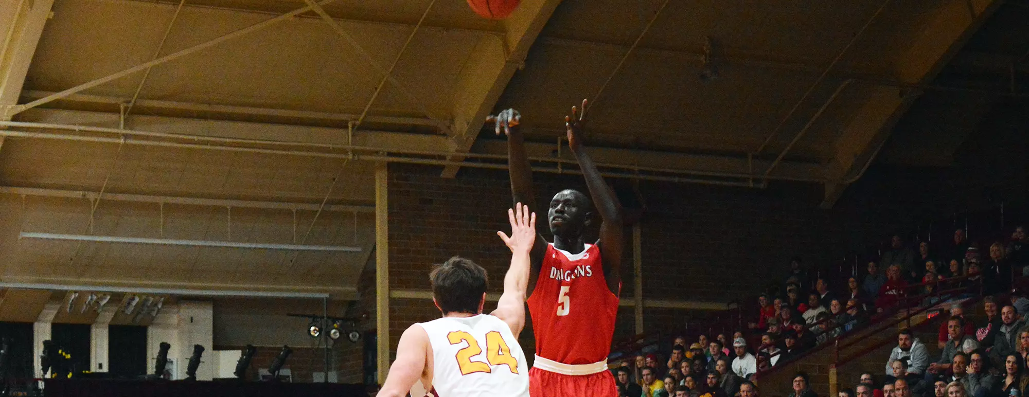 Ayob Ayob puts up a shot against Concordia