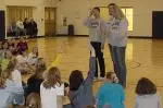 Shen Danru, Mary Lauren Smith and Jenny Duitsman visits with girl scouts at lock-in.