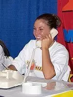 Blair Hardiek helps a donor during today's Jerry Lewis MDA Labor Day Telethon.