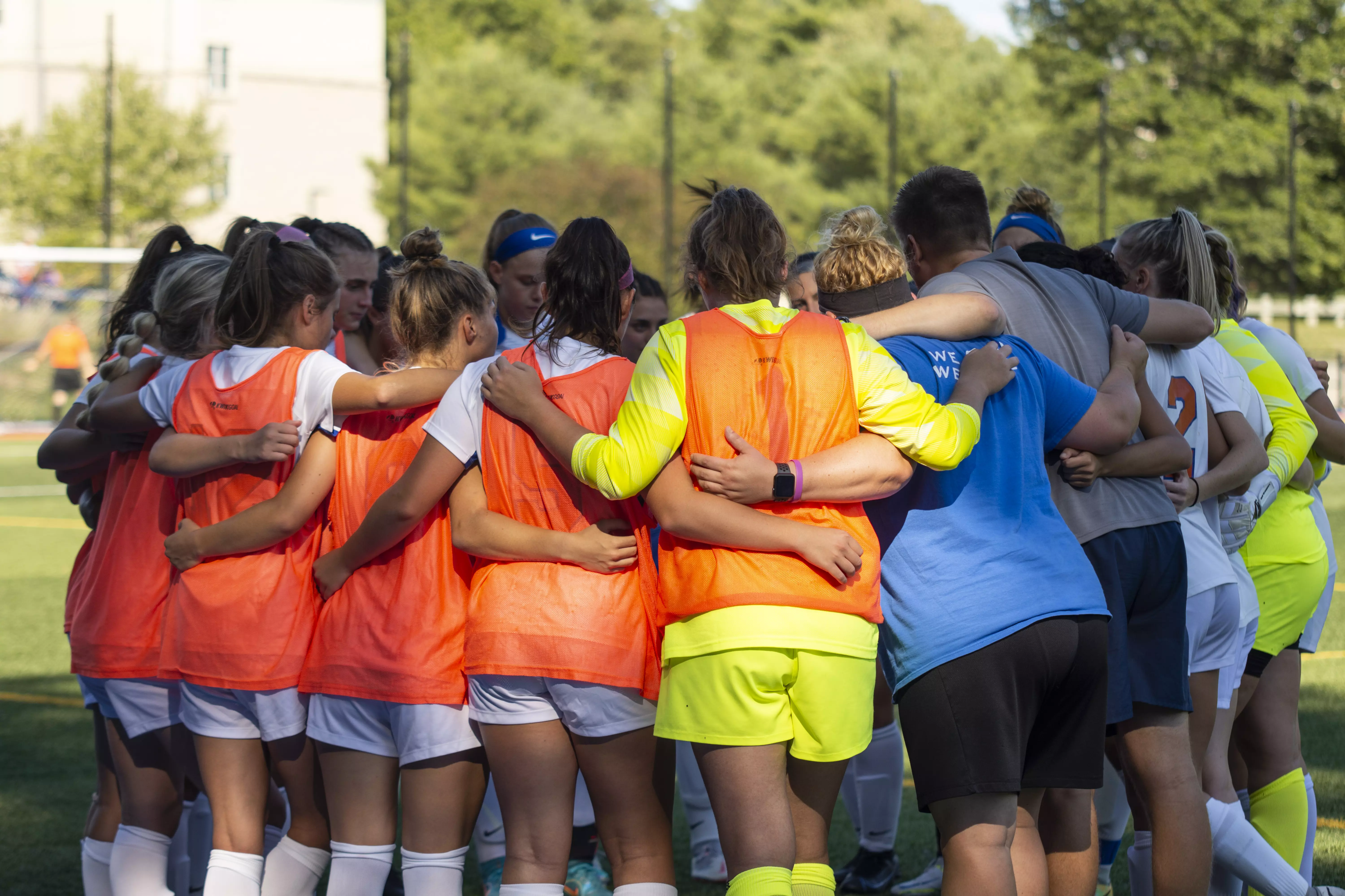 Hawks huddle prior to the start of their game against Mount Saint Mary College on Thursday, Sept. 8 on South Turf Field