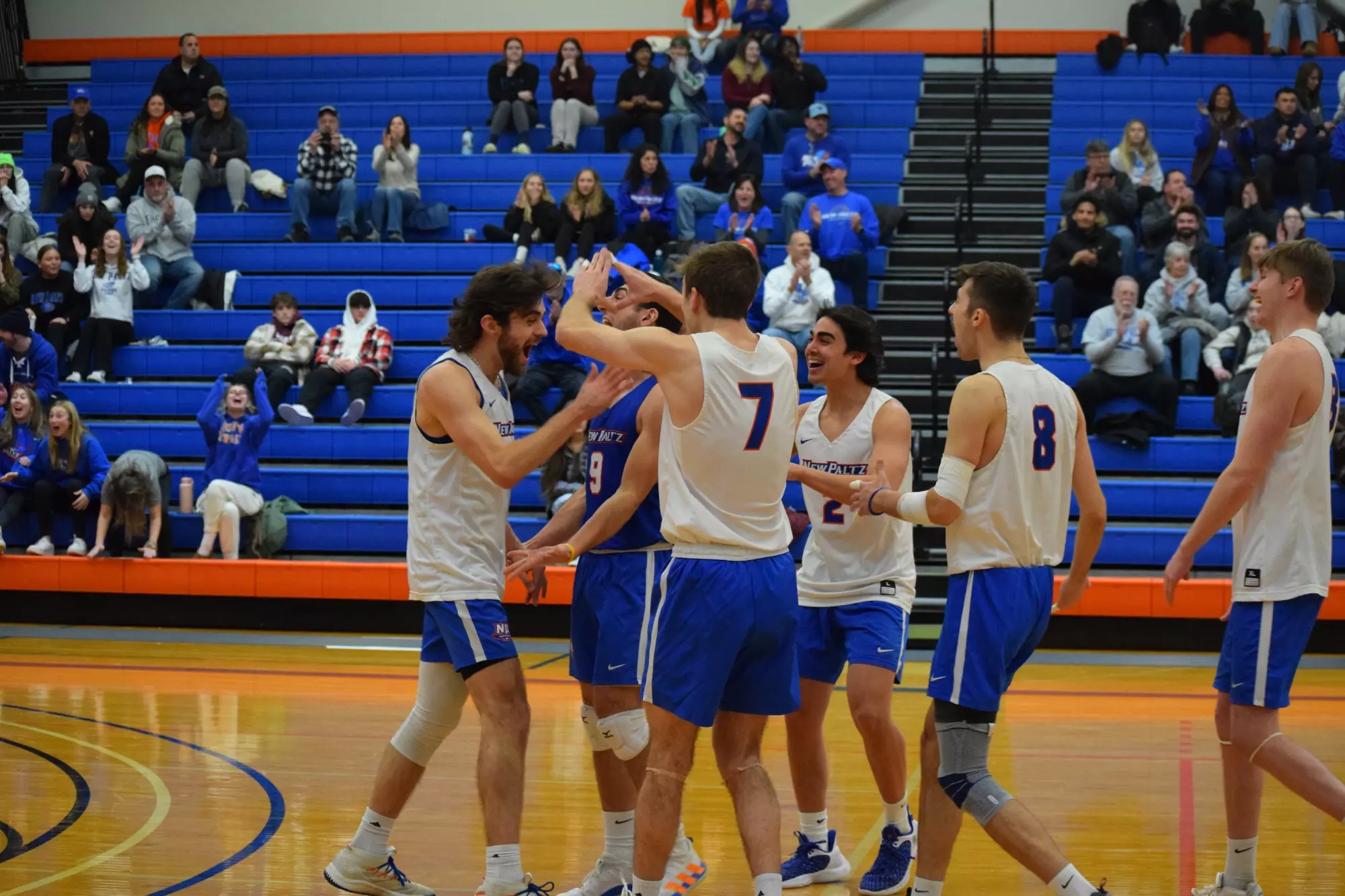 Brendan Spulnick celebrates after an ace 