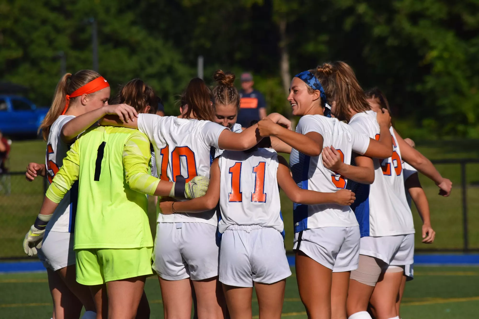 Hawks Women's Soccer huddle before their season opener against Sage 