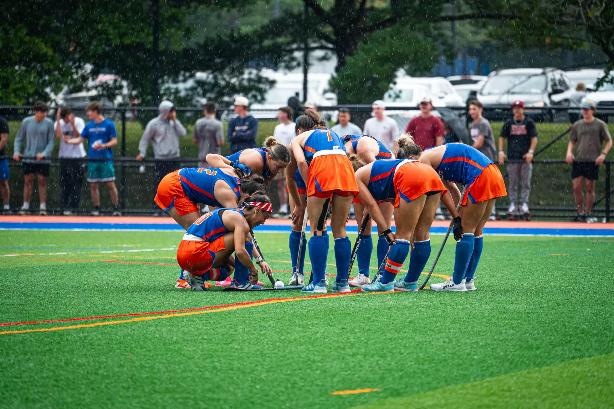 Hawks huddle after a corner