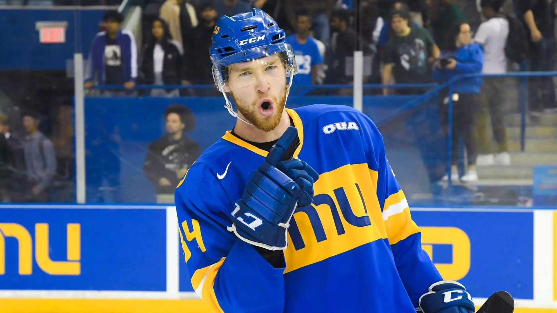 Connor Bowie points at camera after scoring goal