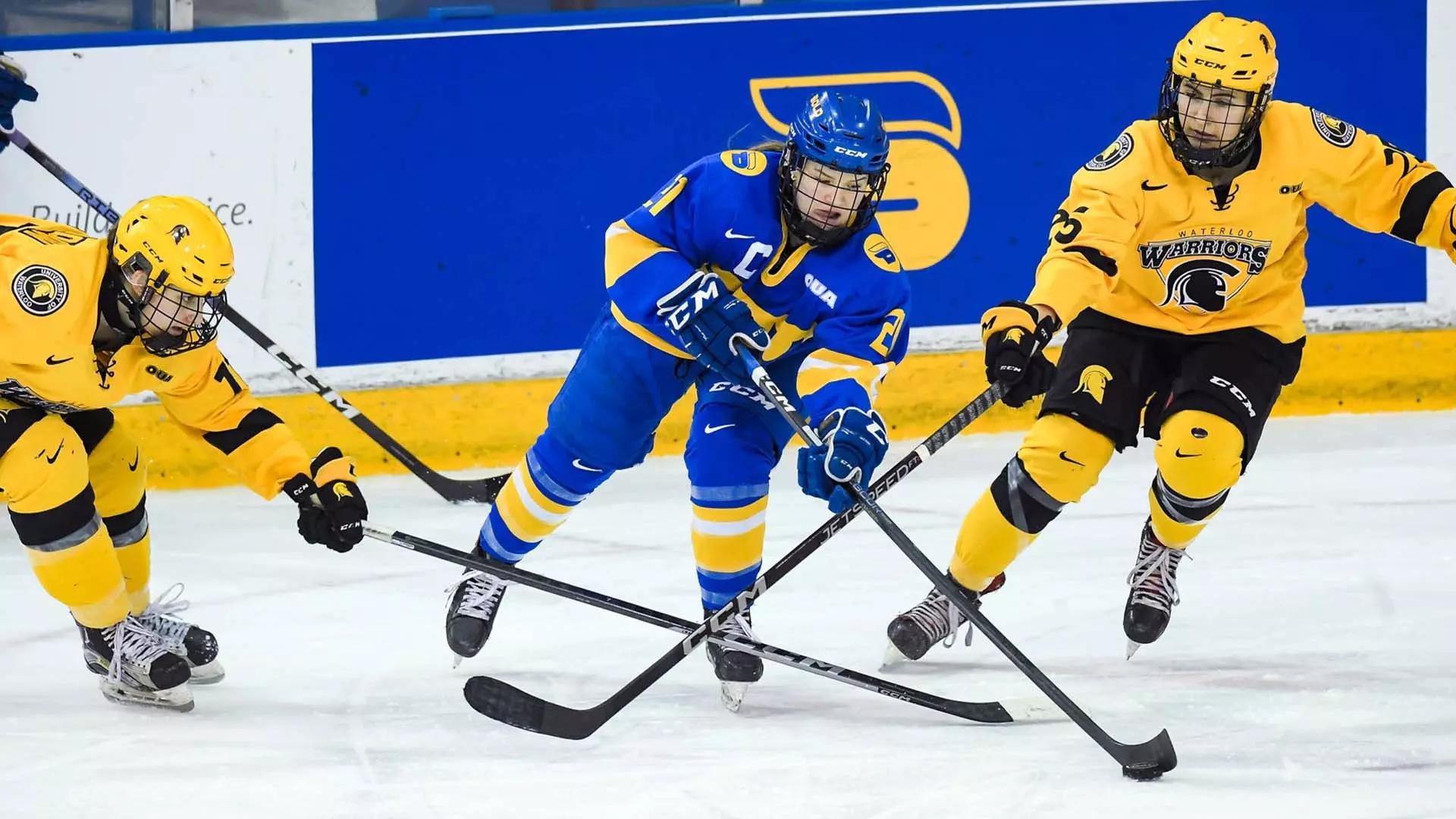 Emily Baxter skates with puck vs Waterloo