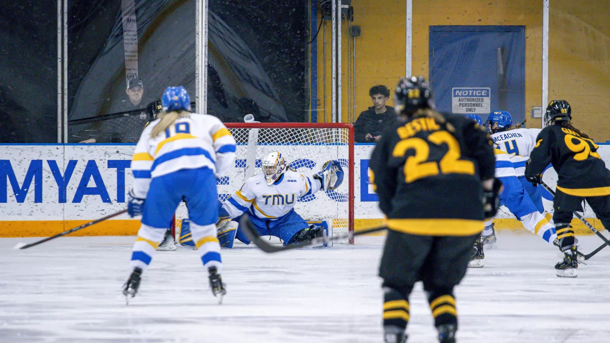TMU goalie Alexia Stratos blocking a shot