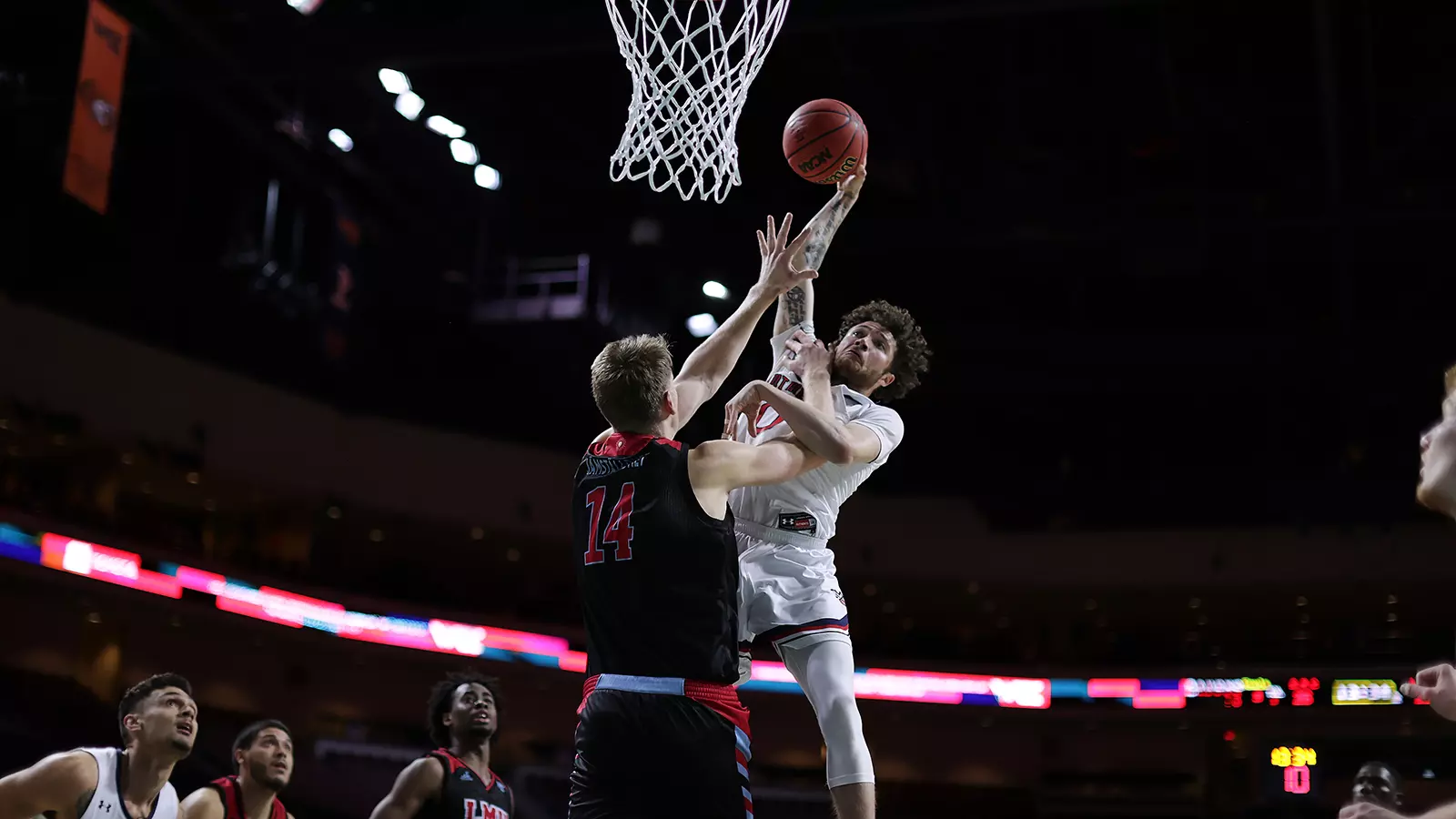 Logan Johnson going for the poster dunk vs LMU