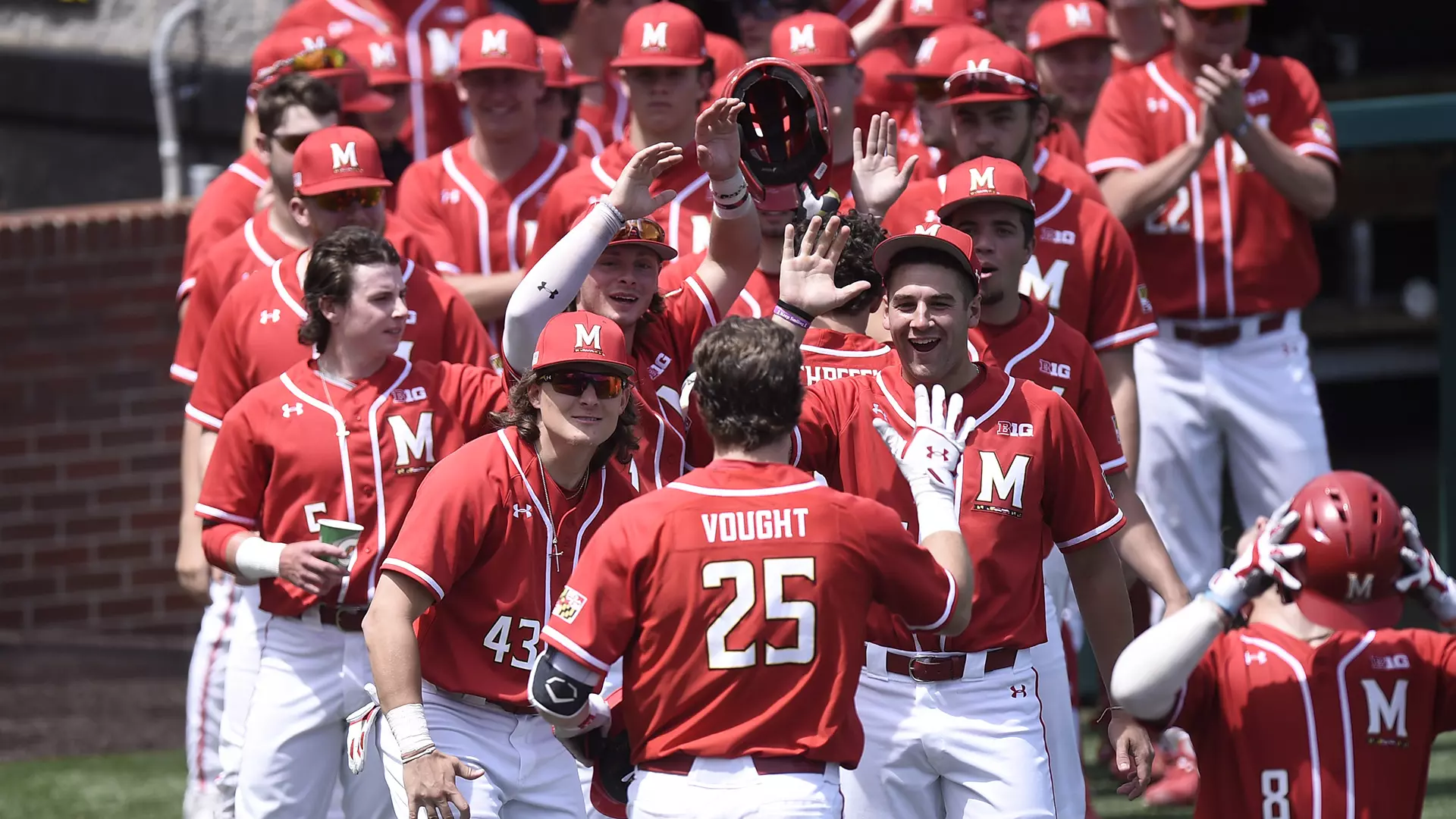 Justin Vought celebrates with teammates vs. Minnesota