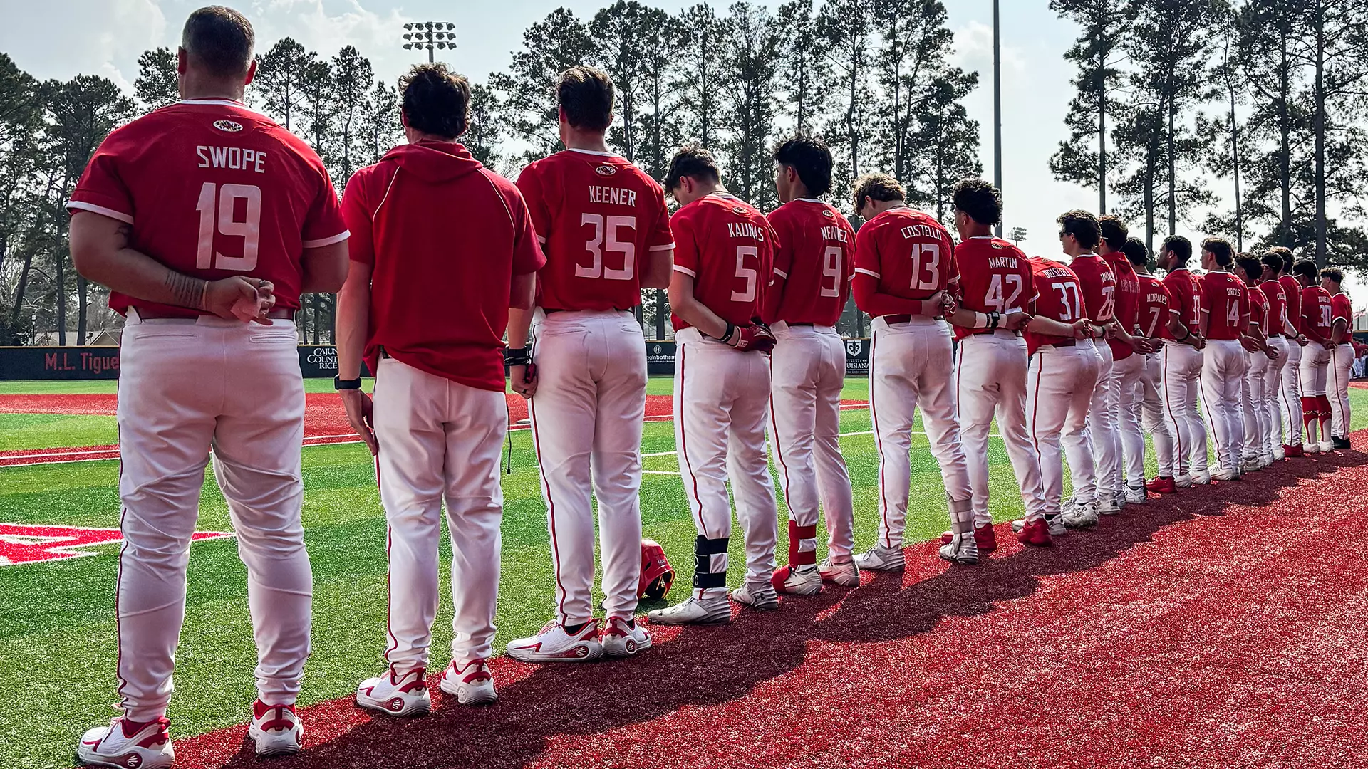 Maryland Baseball Stands For The National Anthem Ahead of a Game Against Louisiana