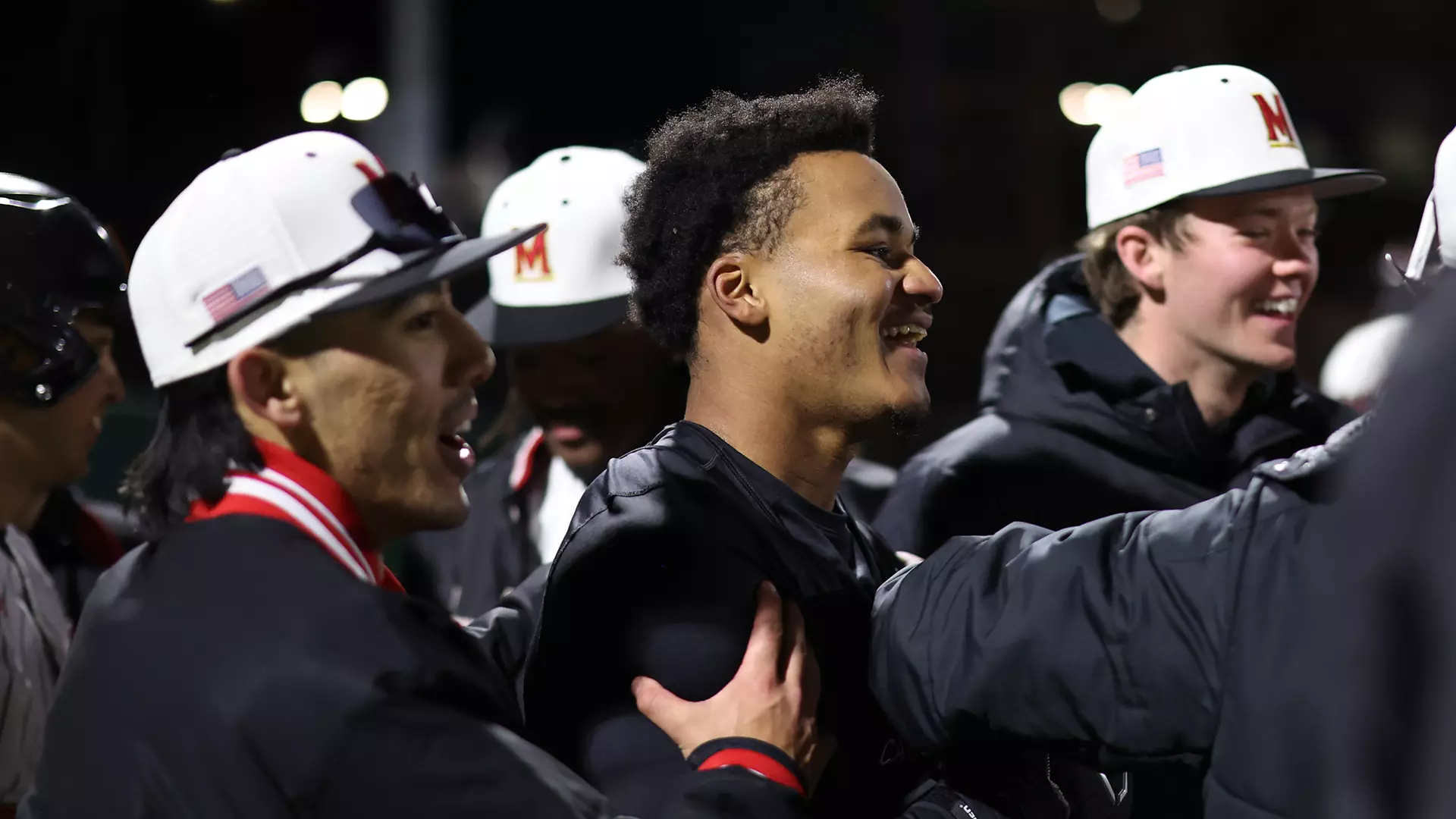 Paul Jones II and the Terps celebrate a walk-off win