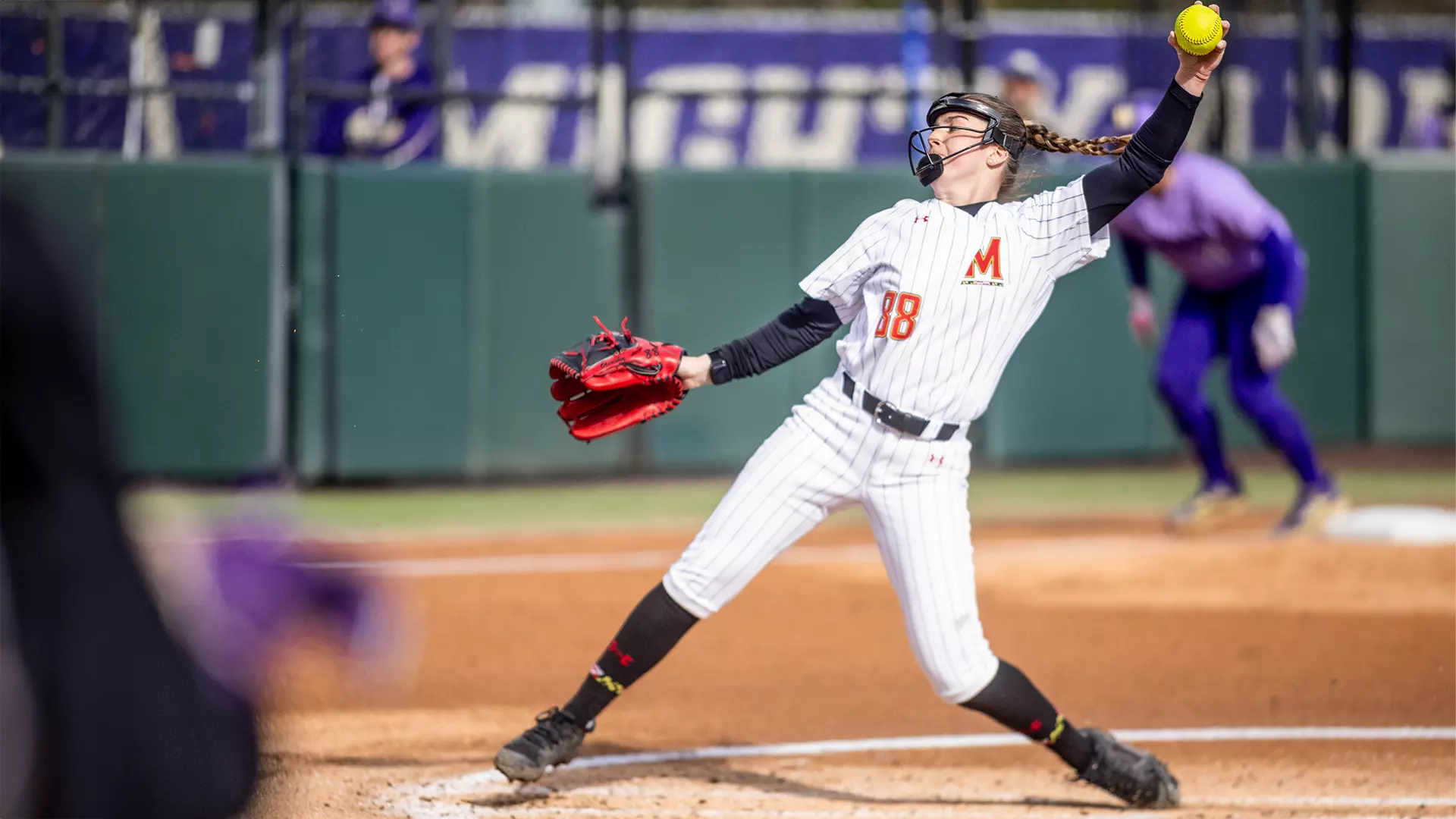 Caitlin Olensky pitching against Washington