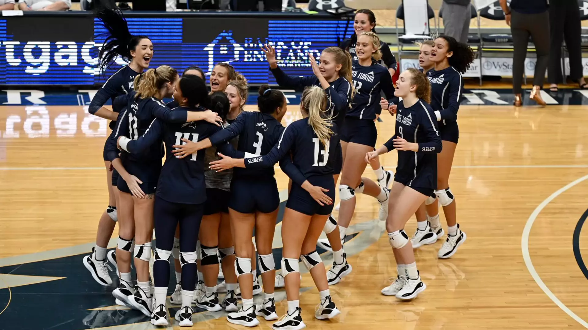 UNF volleyball team celebration