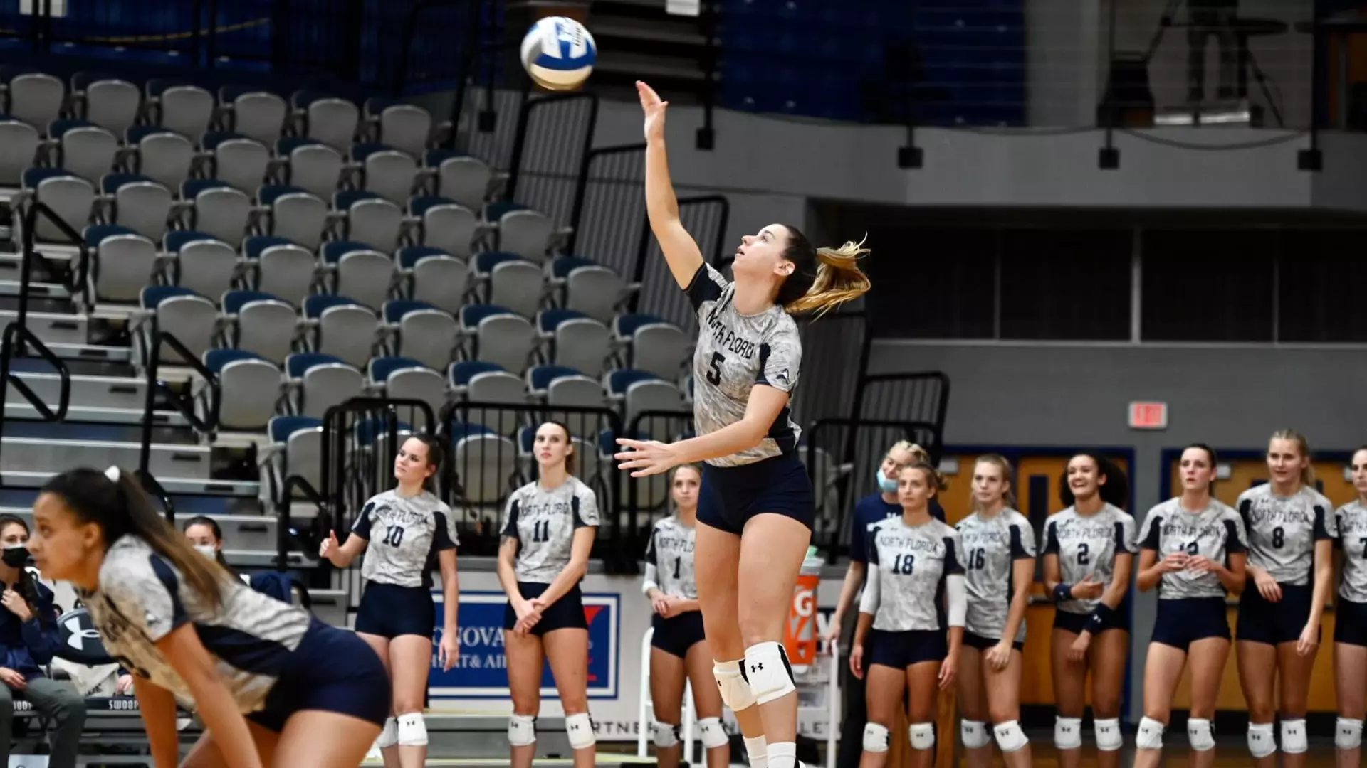 Julianna Askew serves the ball