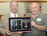 Funeral services for Charlie Key (right) are scheduled at 3:30 p.m. on Monday at First United Methodist Church in Arlington.