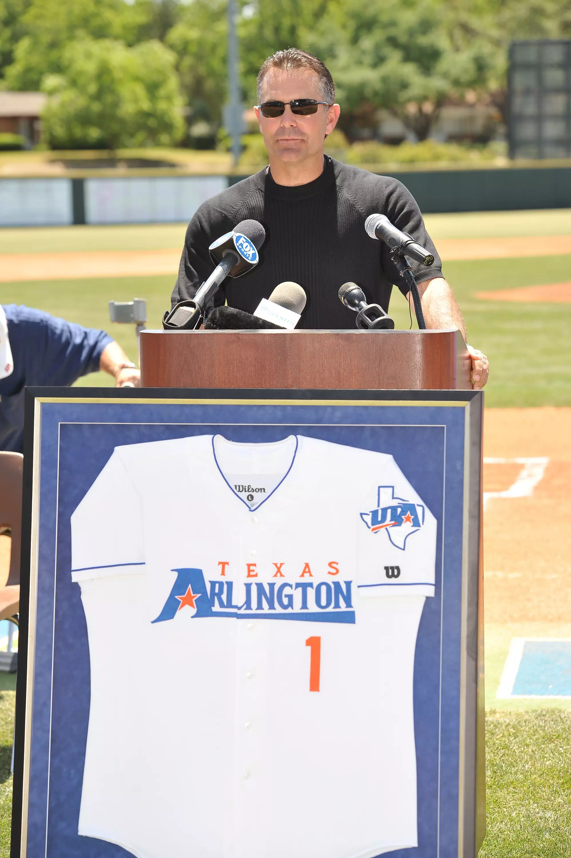 Trey Hillman speaks during his jersey retirment ceremony Saturday afternoon.