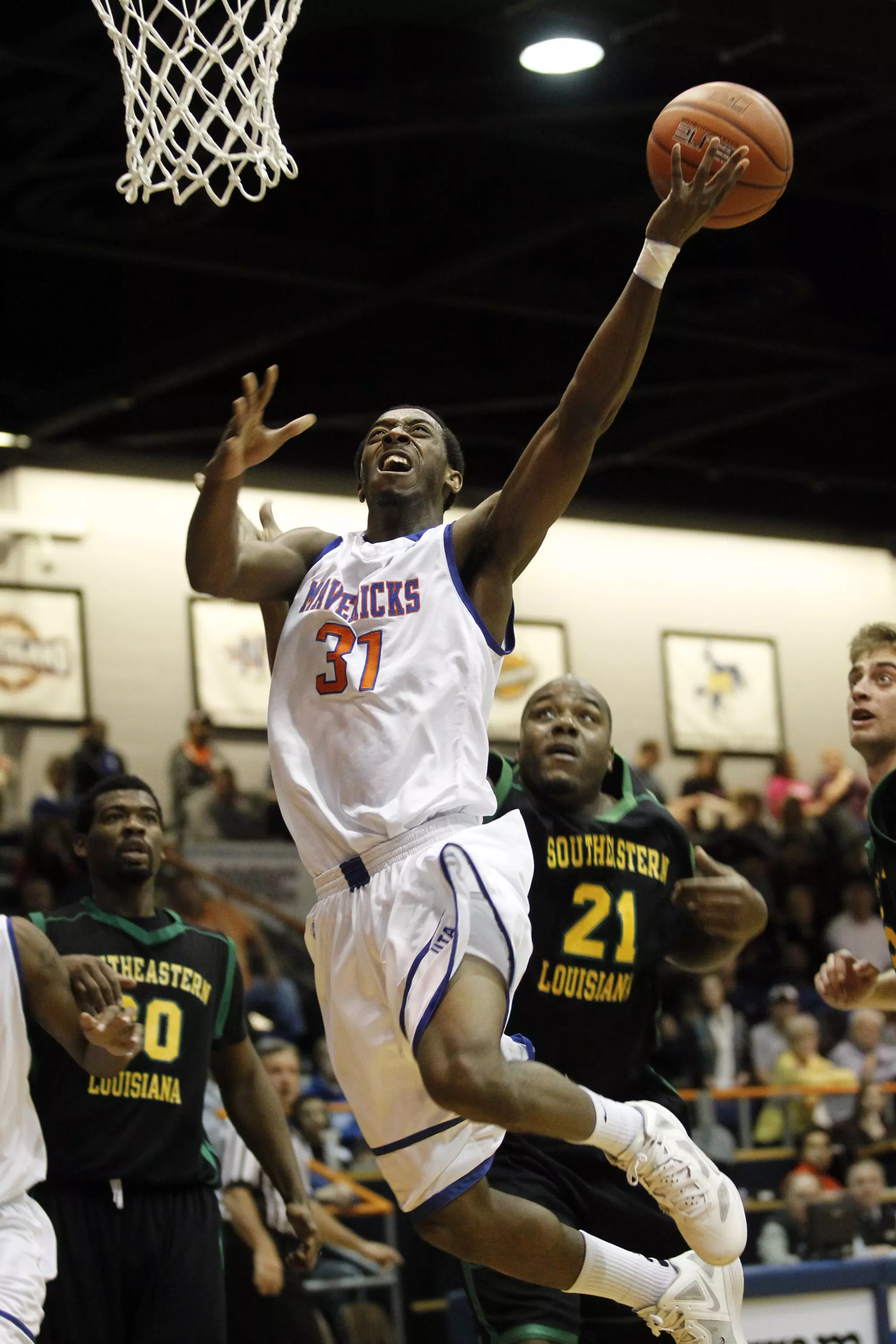 LaMarcus Reed drives to the basket Wednesday night.