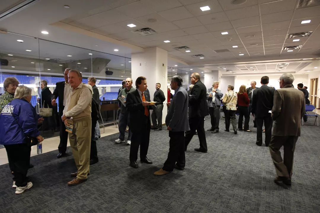 Maverick Club Premium Seat Holders enjoy the CPC's Hospitality Suite Thursday night.