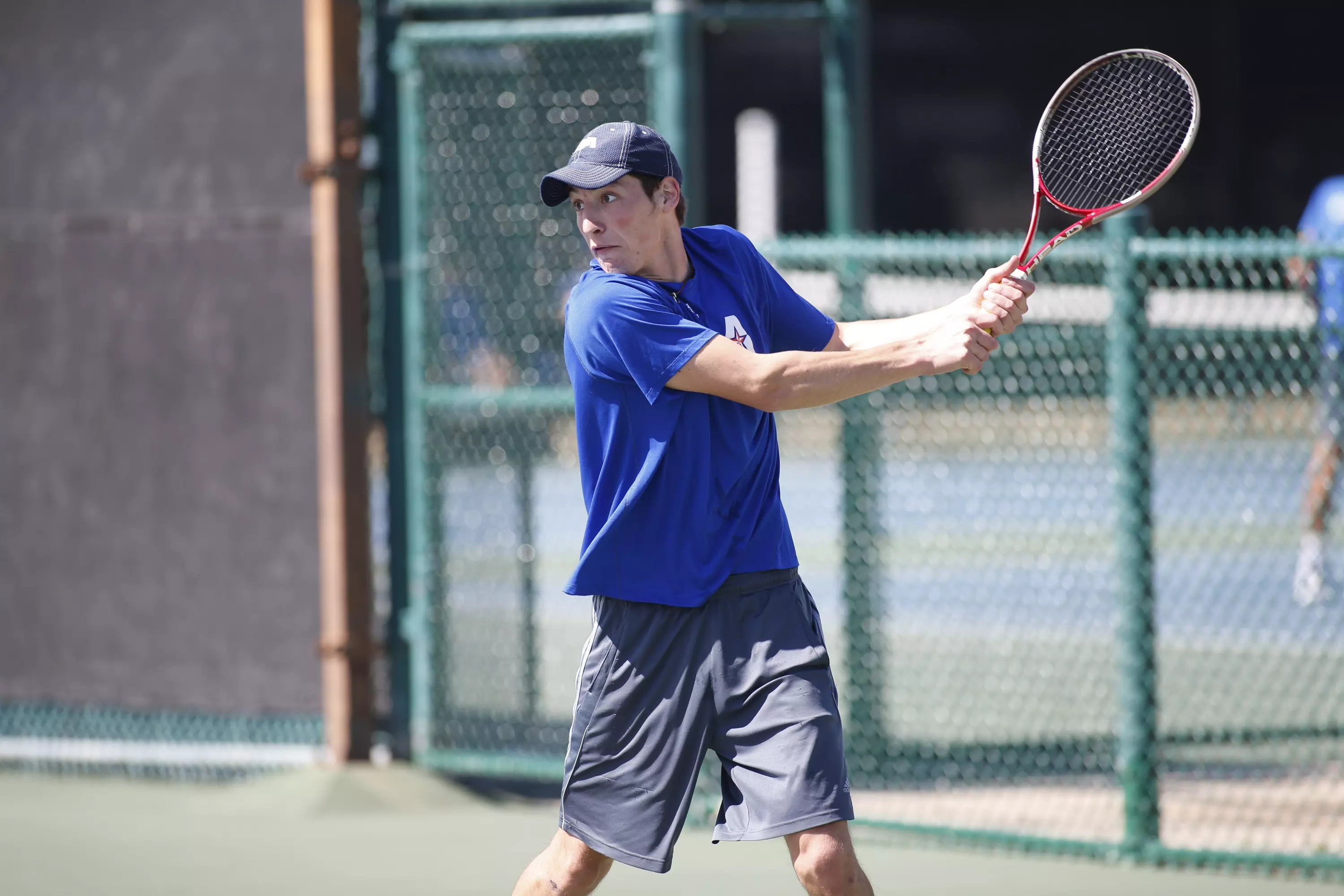 Sophomore Marek Pesicka won his singles competition against the Aggies.