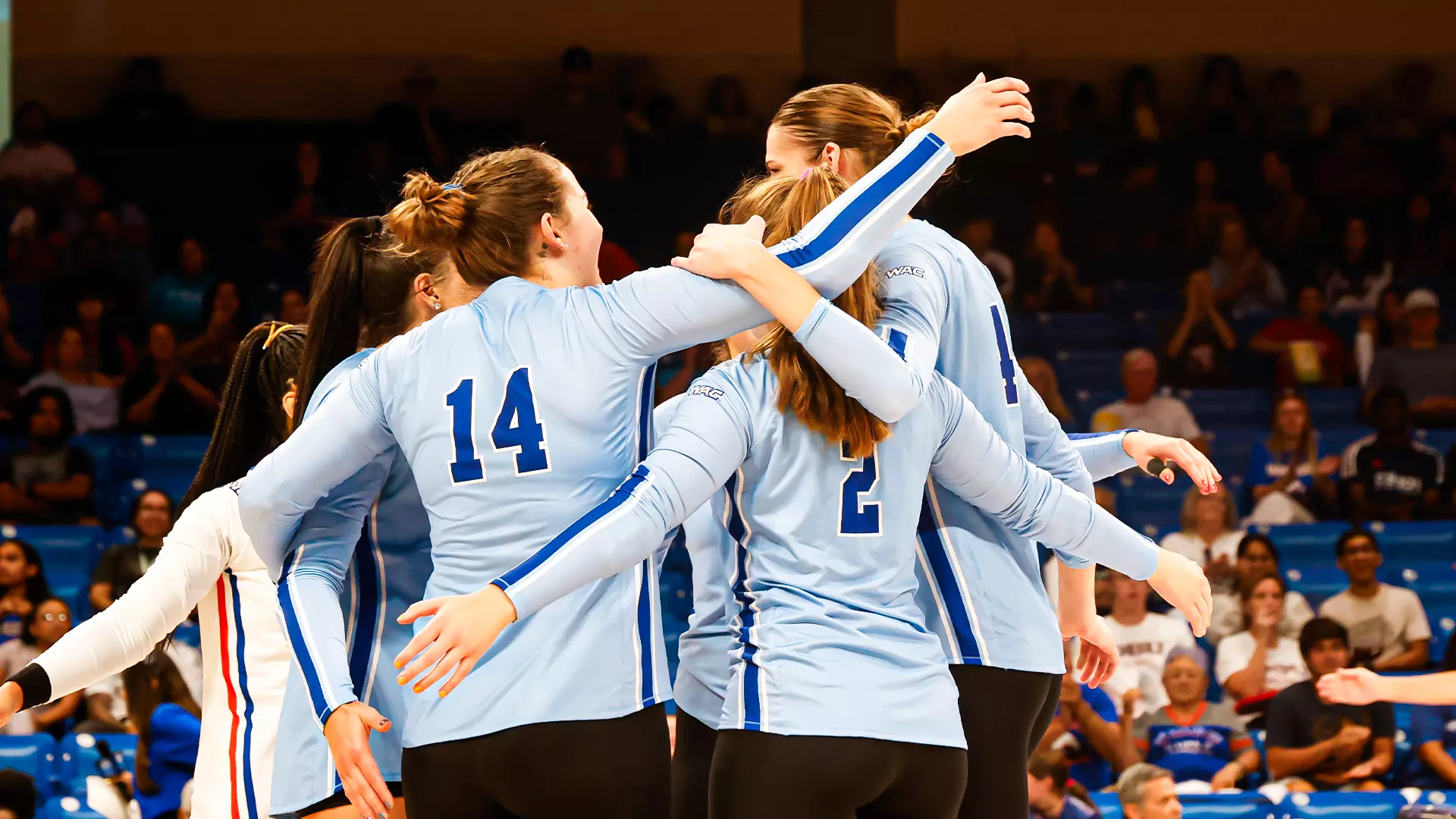 Squad hug after point