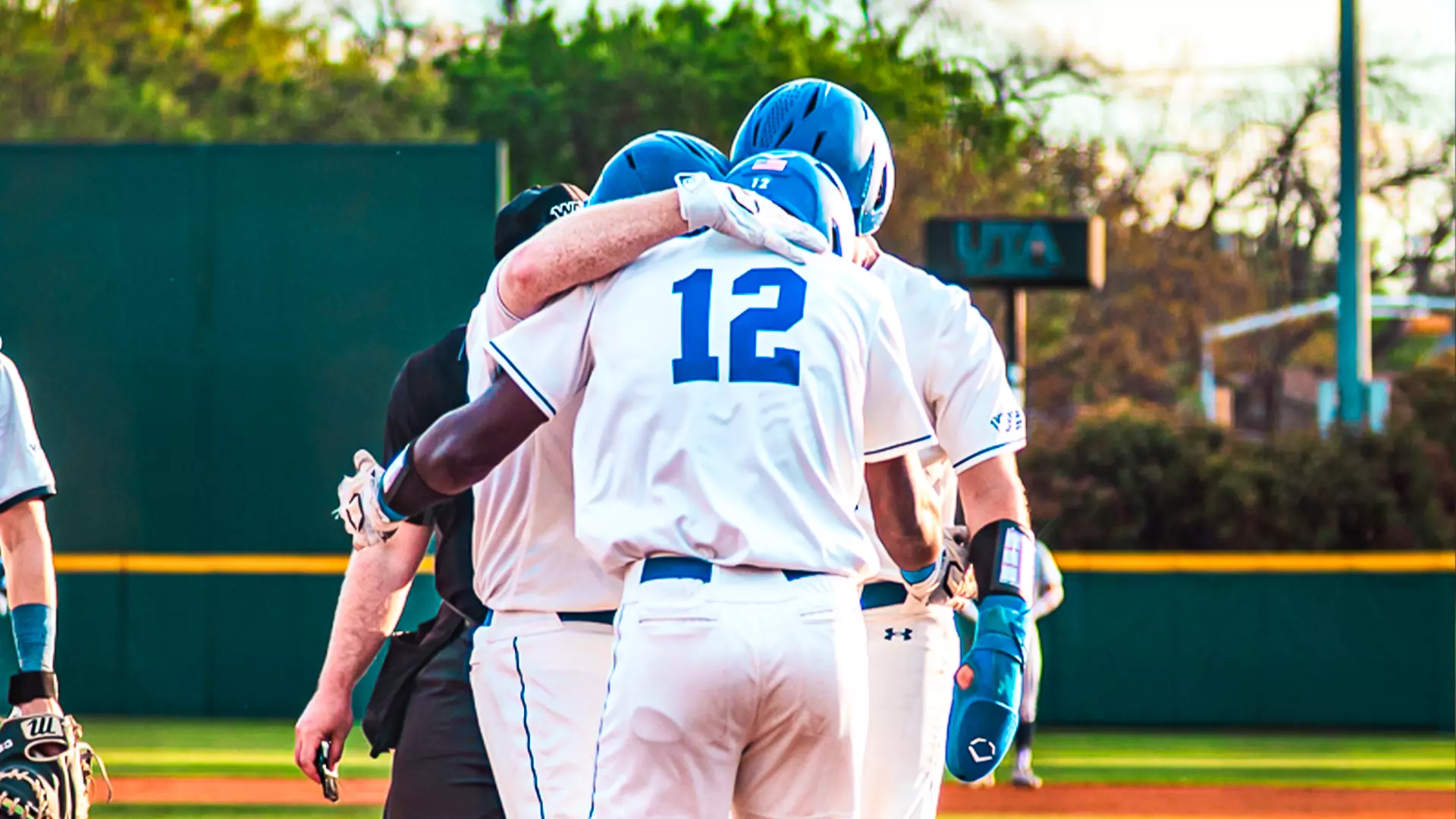 Hug at home plate