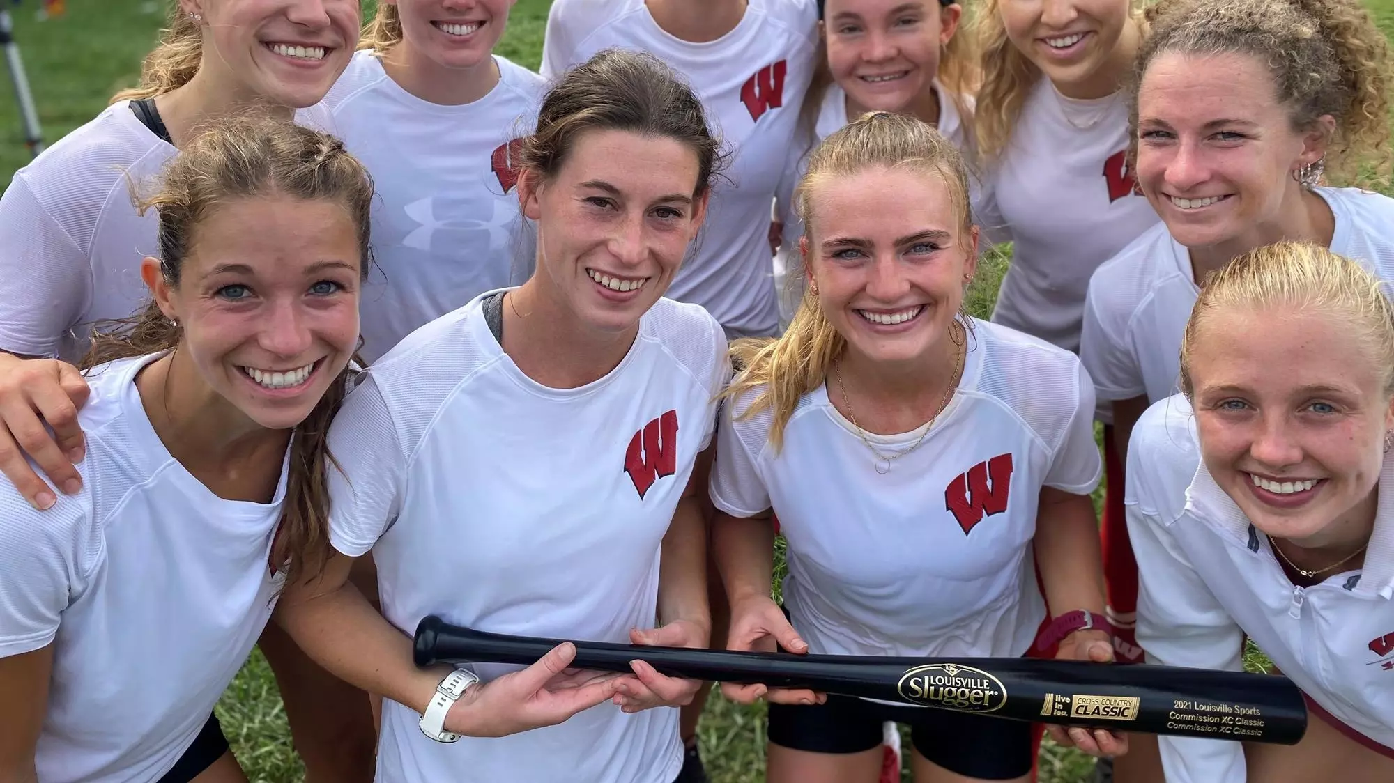 The Badgers pose with a Louisville Slugger after finishing second at Live in Lou. 