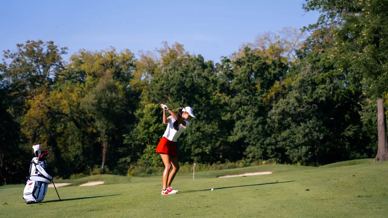 Tammy Wu fires an approach shot at the Badger Invitational