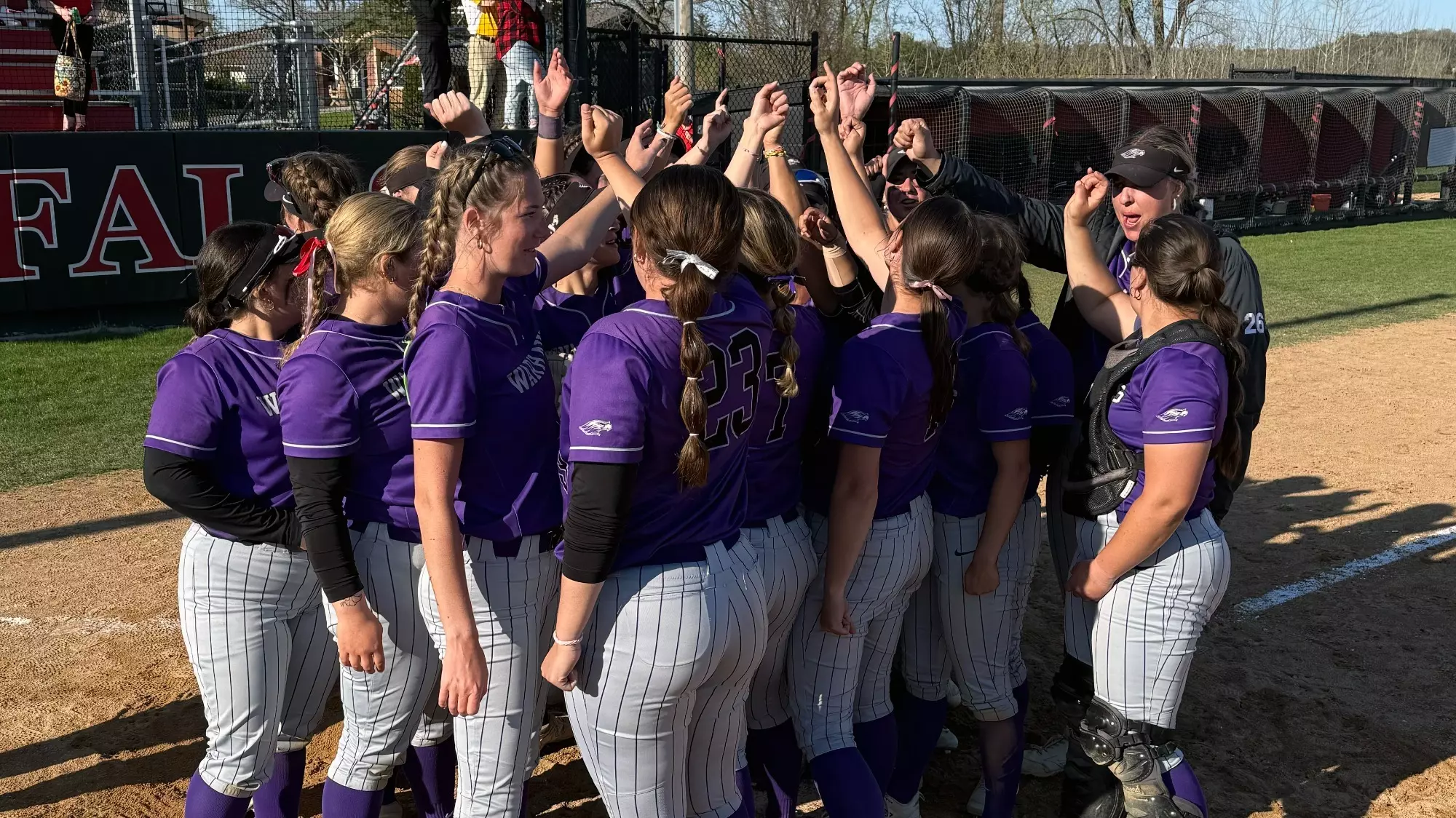Team huddle at home plate