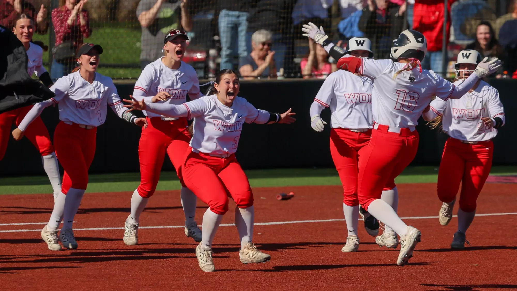 The Wolves celebrate their walk-off win on Saturday