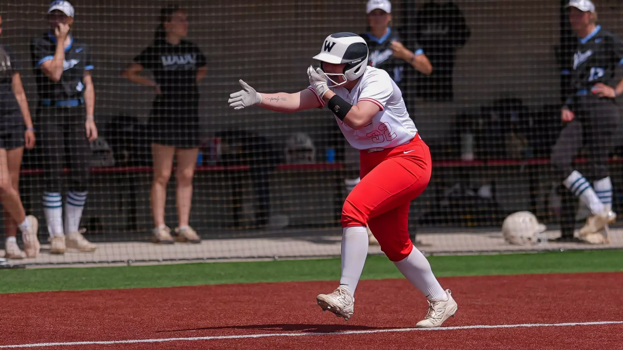 Emma Cordero celebrates her three-run homer against Western Washington on Saturday in Monmouth.