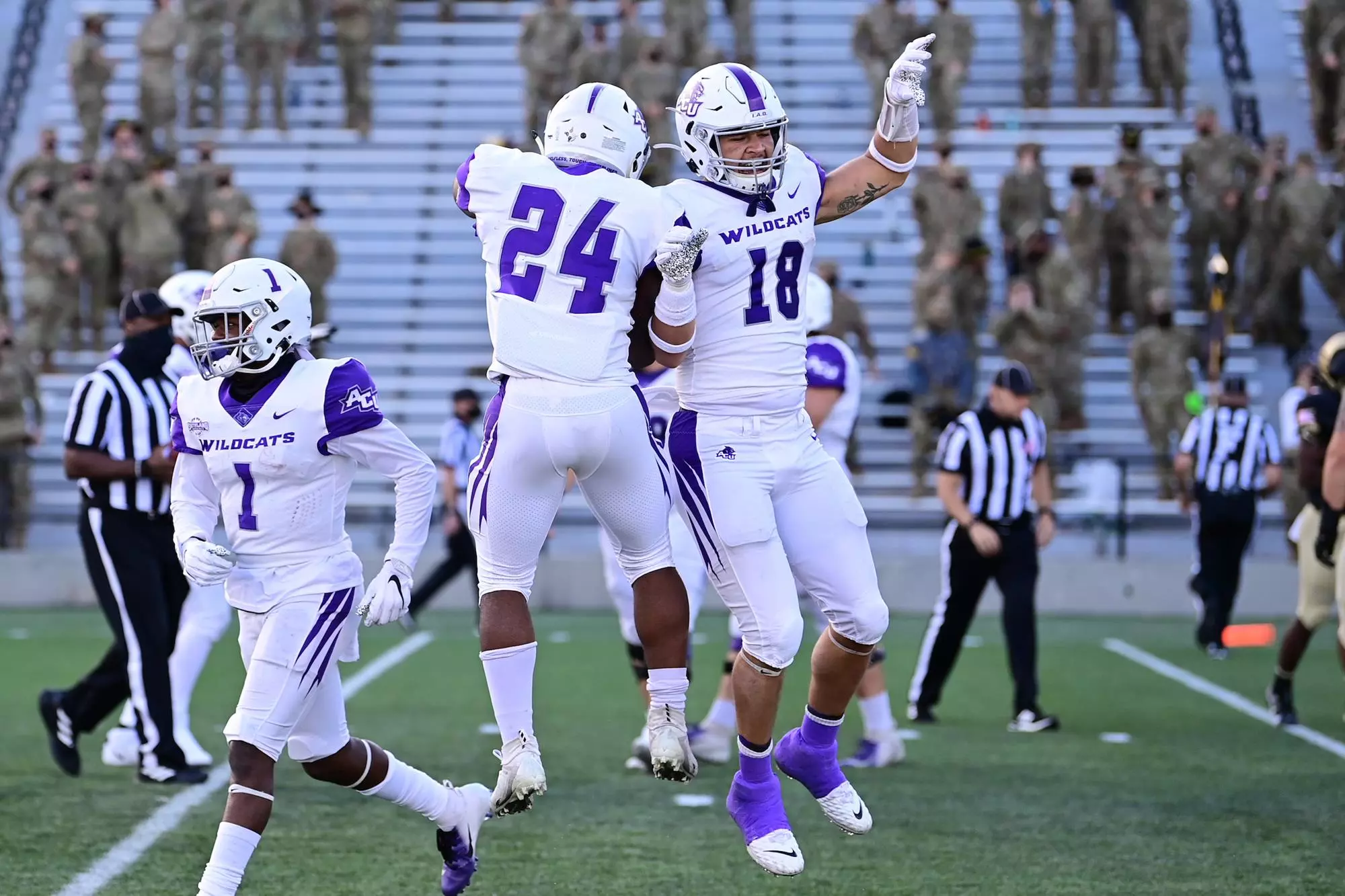 Tyrese White (24) and Branden Hohenstein celebrate at Army.