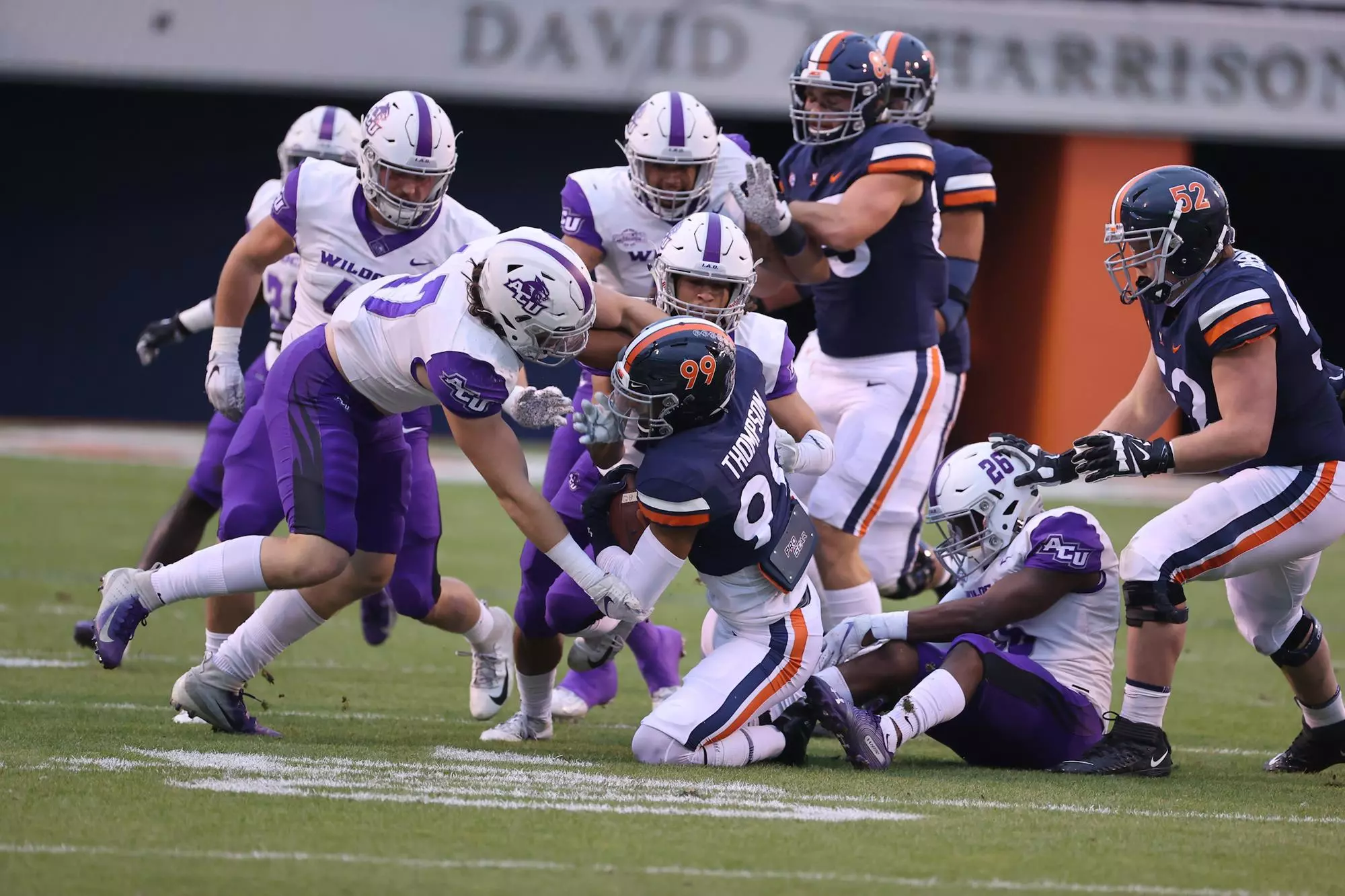 The ACU defense swarms the Virginia running back.
