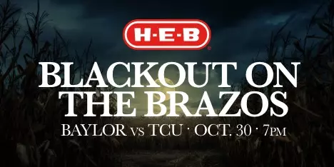Game promotion graphic for Baylor vs. TCU. Large white text reads 'Blackout on the Brazos,' with game details 'Nov. 1, 7 PM.' Background shows a dark, moody path through a cornfield at night with an HEB logo included on the graphic; click for tickets