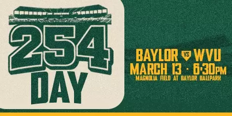 Green and gold graphic reading “254 Day” with a stadium silhouette above the numbers. On the right, text reads “Baylor vs WVU, March 13 – 6:30 PM, Magnolia Field at Baylor Ballpark.” Click to view tickets to the game.