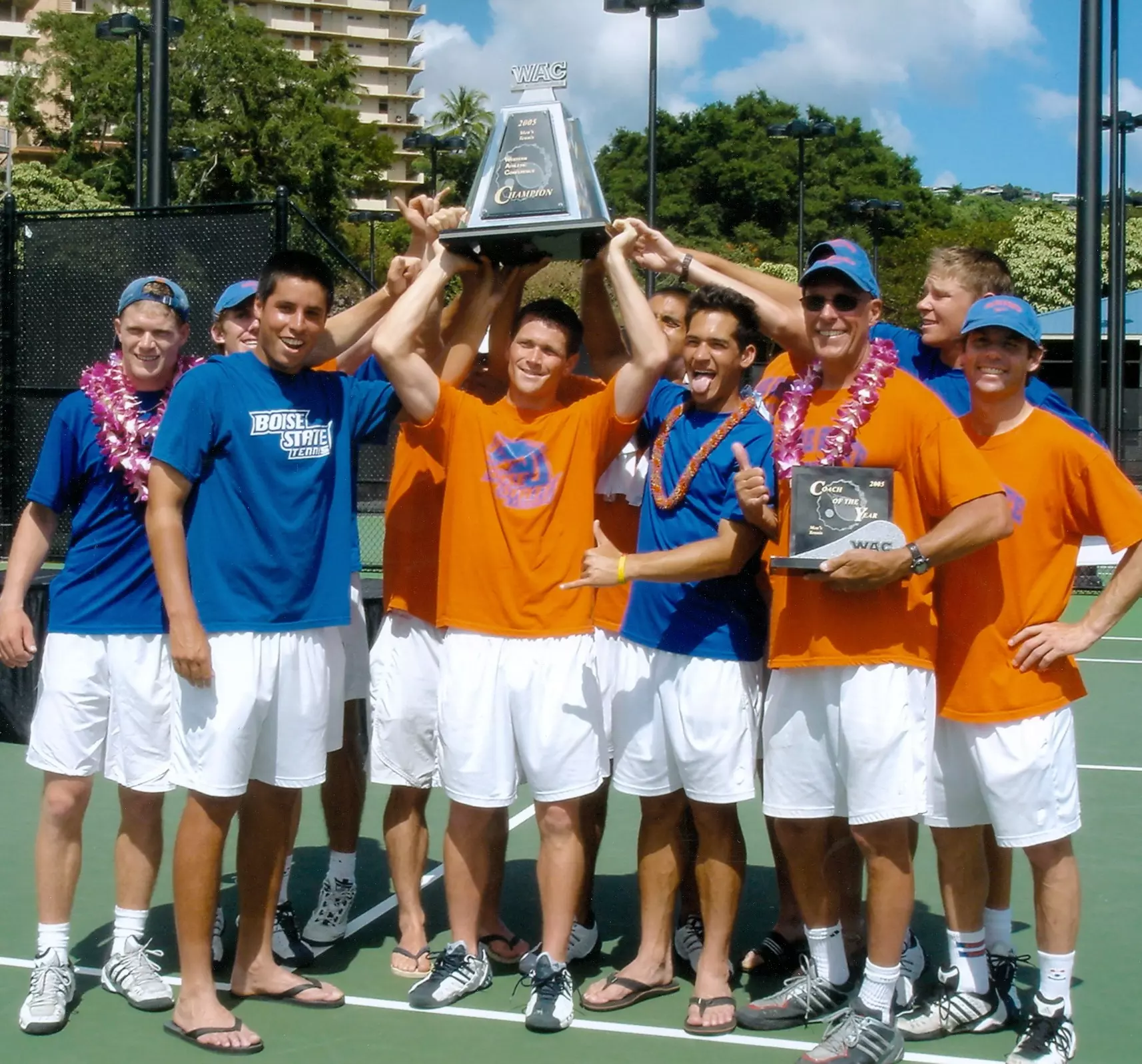 Beck Roghaar hoisting the WAC Trophy