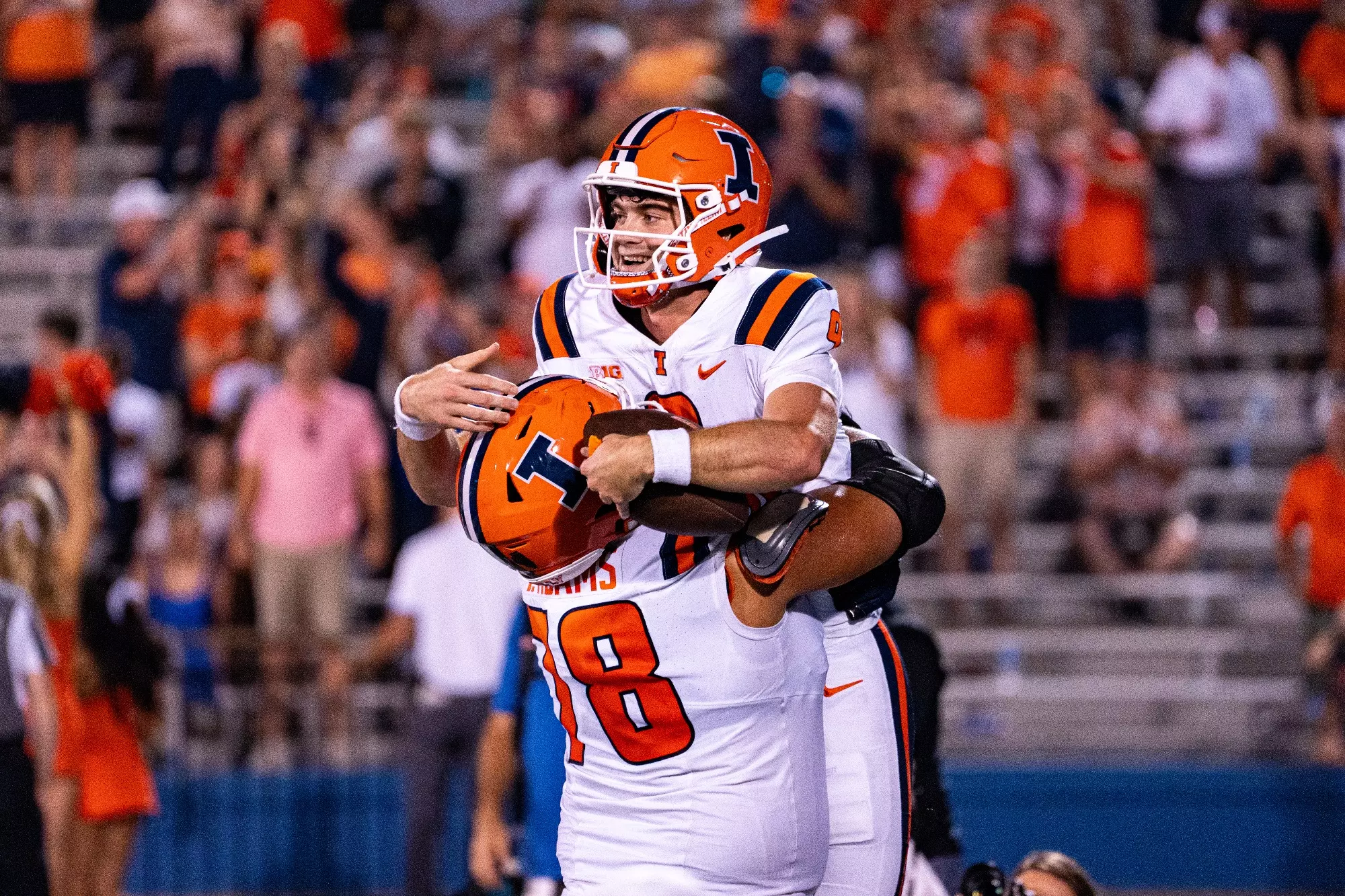 LAWRENCE, KS- September 08, 2023 - Illinois Quarterback Luke Altmyer (#9) and Illinois Offensive Lineman Isaiah Adams (#78) during the game between the Illinois Fighting Illini and the Kansas Jayhawks at David Booth Kansas Memorial Stadium in Lawrence, KS. Photo By Patrick Pierson