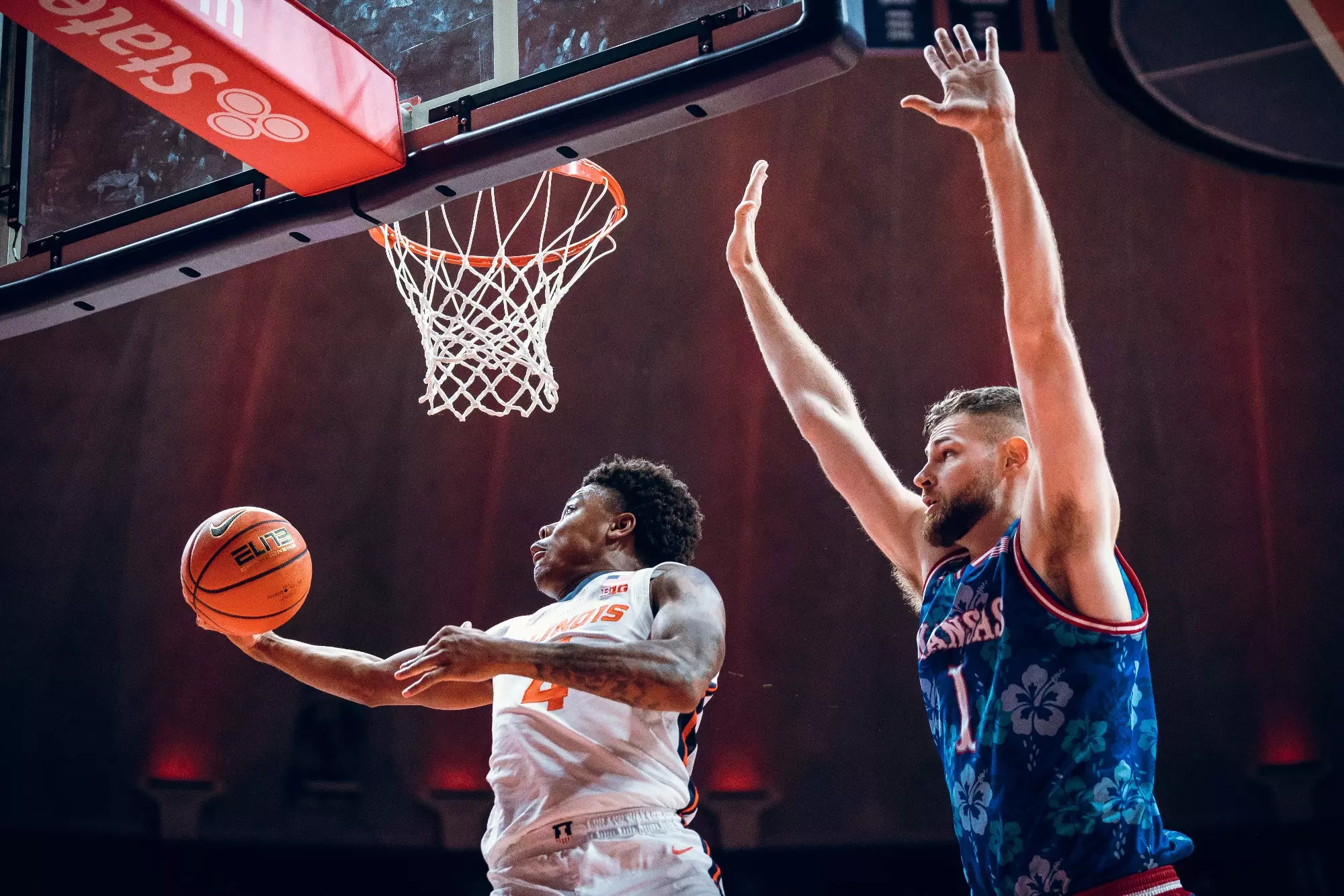 CHAMPAIGN, IL - October 29, 2023 - Illinois Guard Justin Harmon (#4) during the Maui Charity Exhibition game between the Kansas Jayhawks and the Illinois Fighting Illini at State Farm Center in Champaign, IL. Photo By Courtney Bay