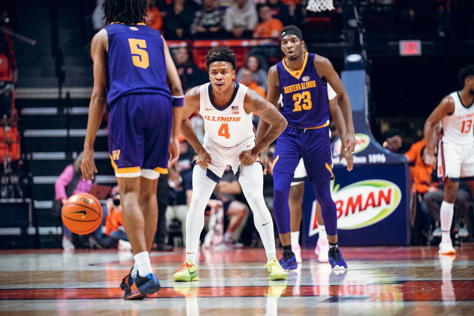 CHAMPAIGN, IL - November 24, 2023 - Illinois Guard Justin Harmon (#4) during the game between the Western Illinois Leathernecks and the Illinois Fighting Illini at State Farm Center in Champaign, IL. Photo By Courtney Bay