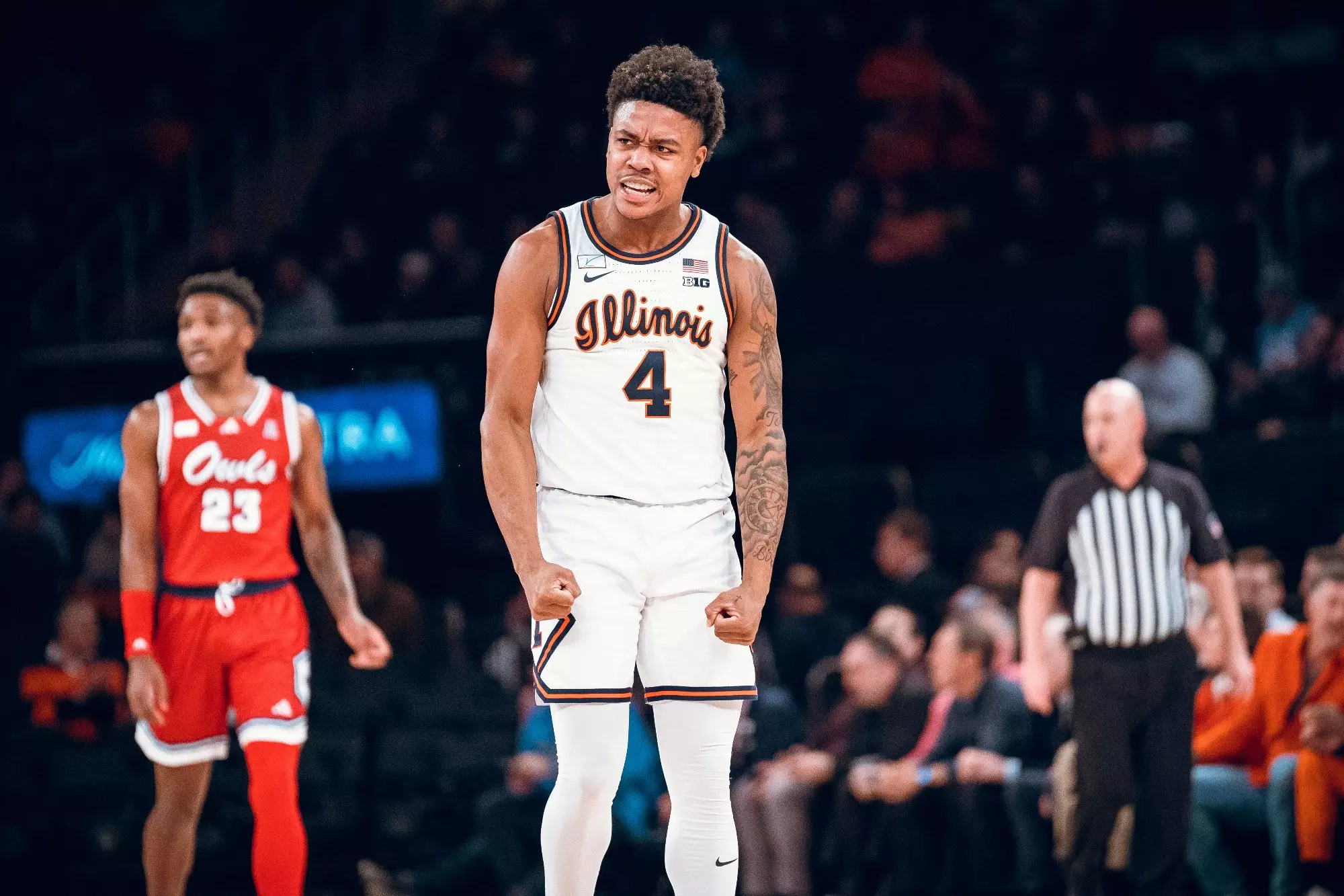 New York City, NY - December 05, 2023 - Illinois Guard Justin Harmon (#4) during the game between the Florida Atlantic Owls and the Illinois Fighting Illini at Madison Square Garden in New York City, NY. Photo By Courtney Bay