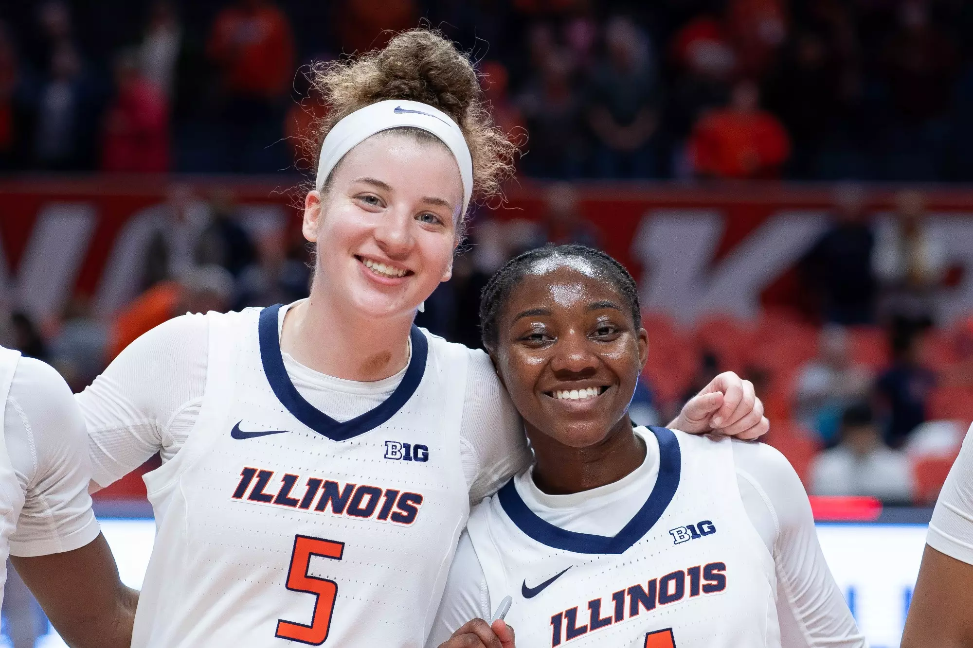CHAMPAIGN, IL - January 17, 2024 - Illinois Guard Gretchen Dolan (#5) and Illinois Guard Kam'Ren Rhodes (#4) after the game between the Rutgers Scarlet Knights and the Illinois Fighting Illini at State Farm Center in Champaign, IL. Photo By Madison Dabrowski