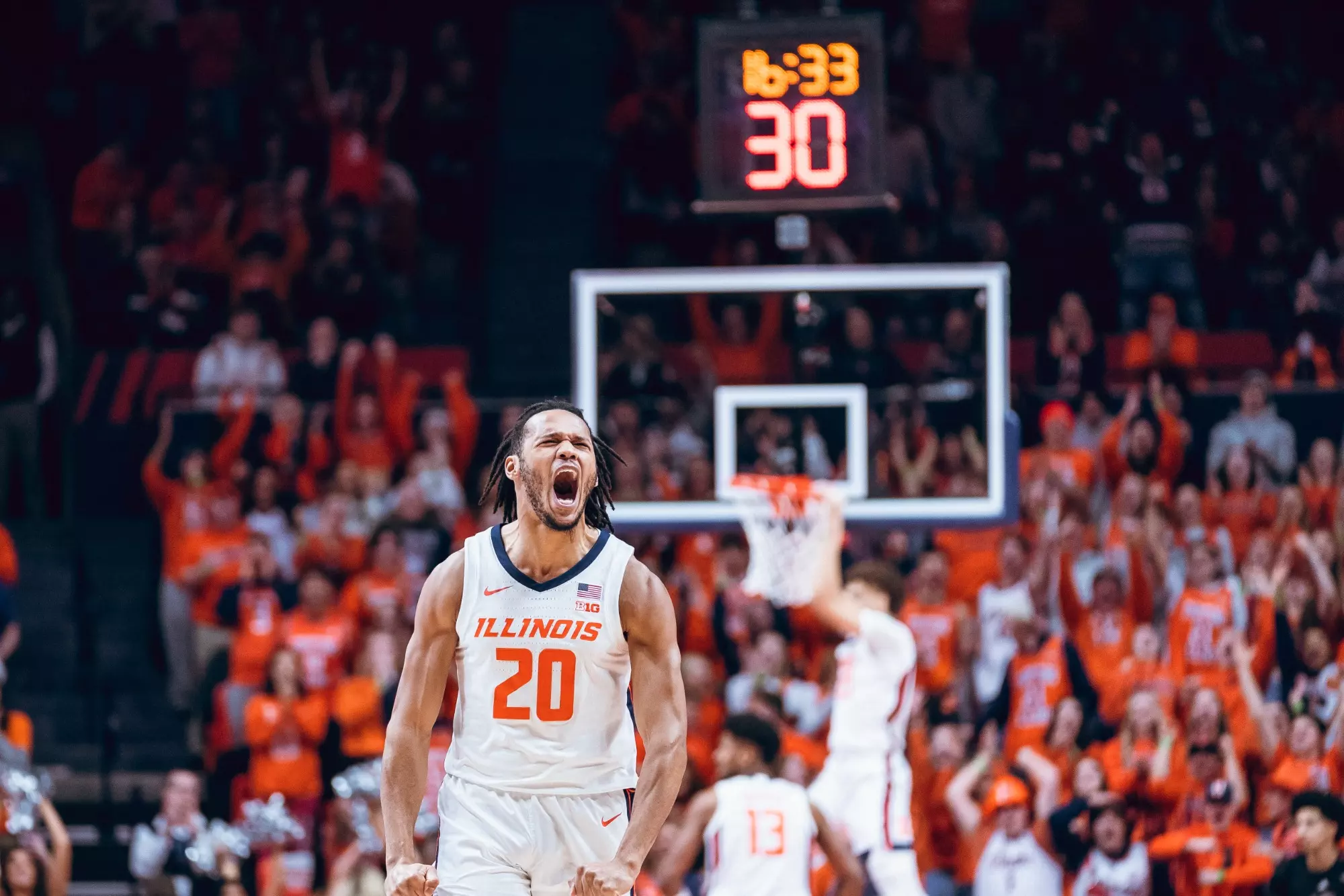 CHAMPAIGN, IL - January 21, 2024 - Illinois Guard/Forward Ty Rodgers (#20) during the game between the Rutgers Scarlet Knights and the Illinois Fighting Illini at State Farm Center in Champaign, IL. Photo By Leigh McGuirk