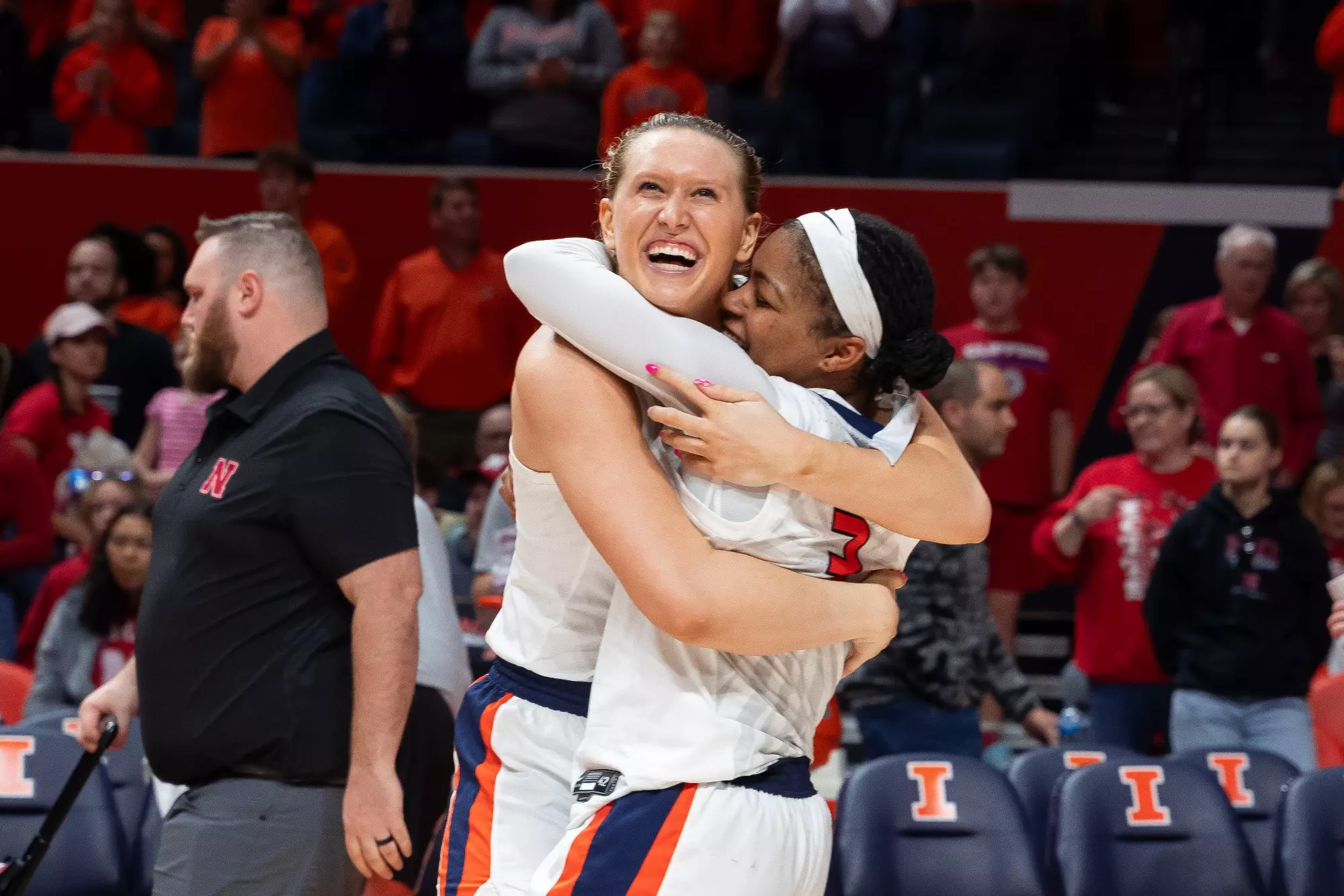 CHAMPAIGN, IL - March 03, 2024 - Illinois Forward Shay Bollin (#22) and Illinois Guard Makira Cook (#3) after the game between the Nebraska Cornhuskers and the Illinois Fighting Illini at State Farm Center in Champaign, IL. Photo By Kevin Snyder