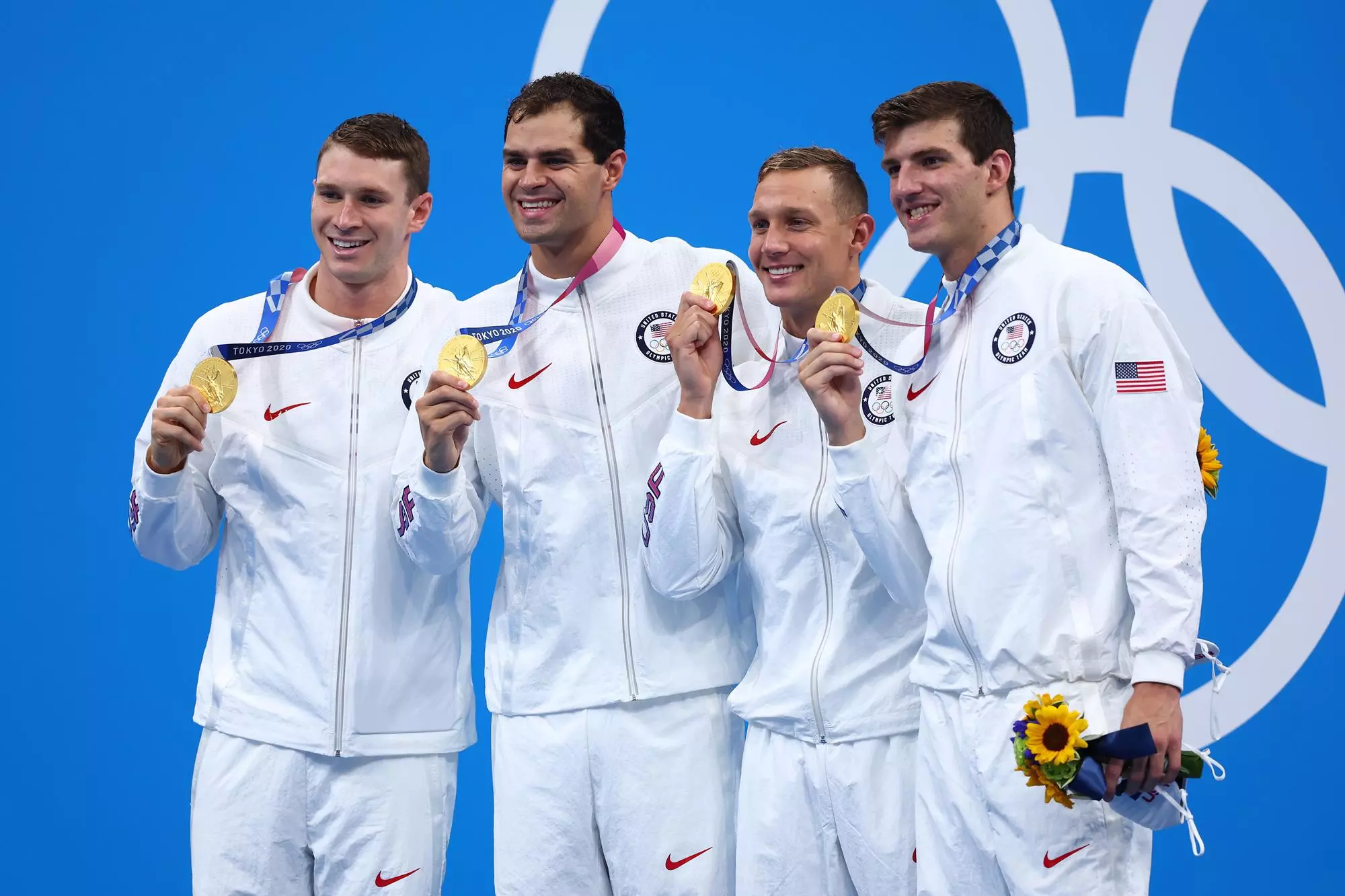 TOKYO, JAPAN - AUGUST 01: (L-R) Gold medalists Ryan Murphy, Michael Andrew, Caeleb Dressel and Zach Apple of Team United States pose on the podium during the medal ceremony for the Men's 4 x 100m Medley Relay Final on day nine of the Tokyo 2020 Olympic Games at Tokyo Aquatics Centre on August 01, 2021 in Tokyo, Japan. (Photo by Maddie Meyer/Getty Images)