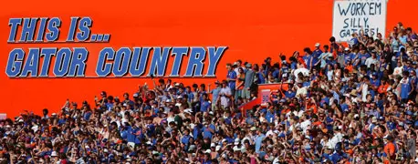 This is Gator Country stadium signage with football fans