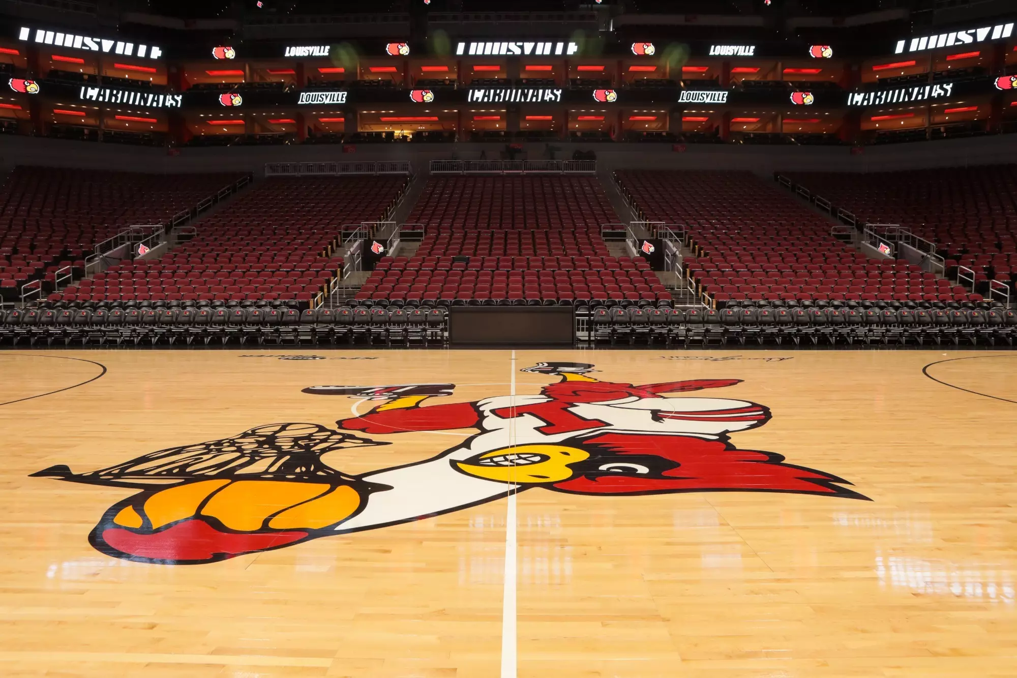 Sit courtside for Louisville Basketball by purchasing floor seats at the KFC Yum! Center.