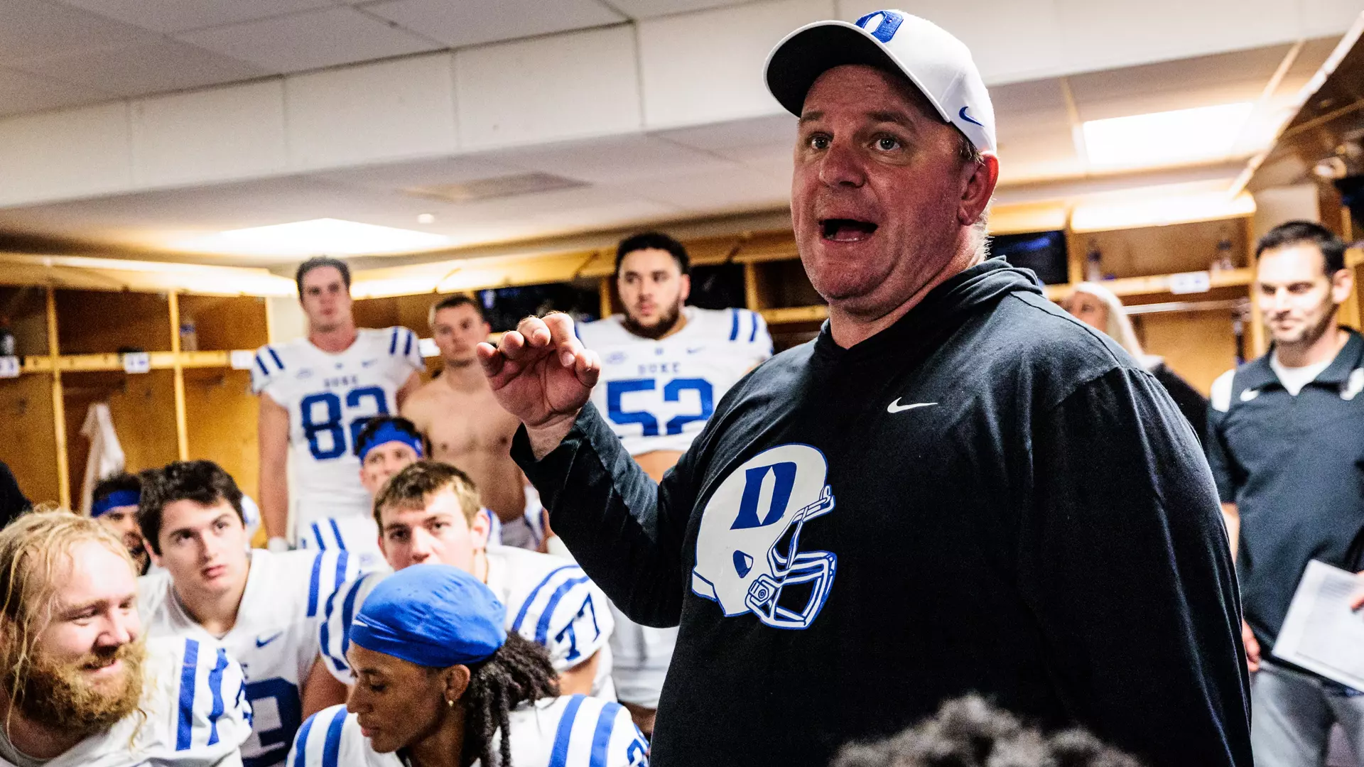 Duke head football coach Mike Elko addresses the team after they become bowl eligible