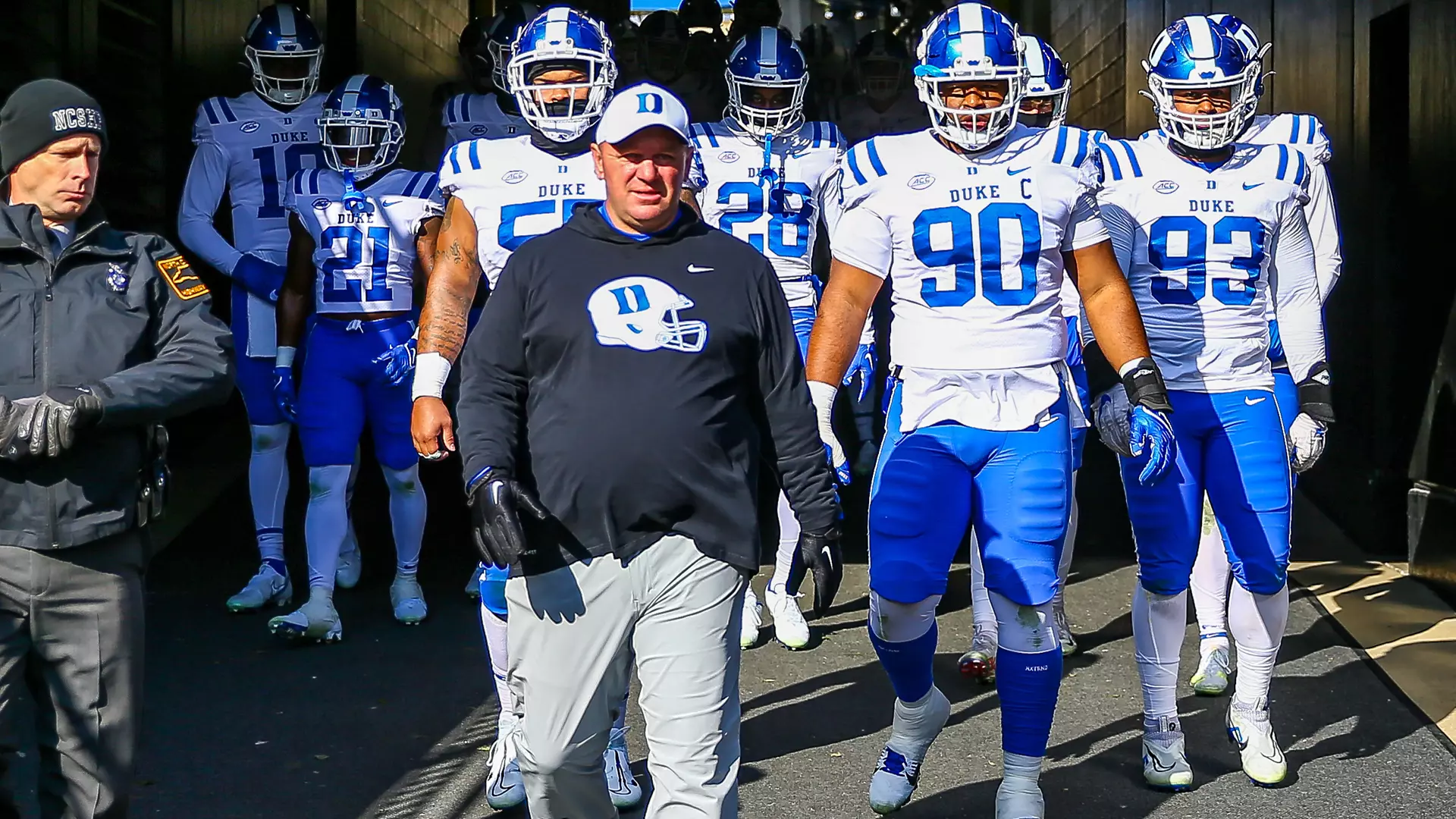 Mike Elko walks the team out of the locker room pregame against Pittsburgh